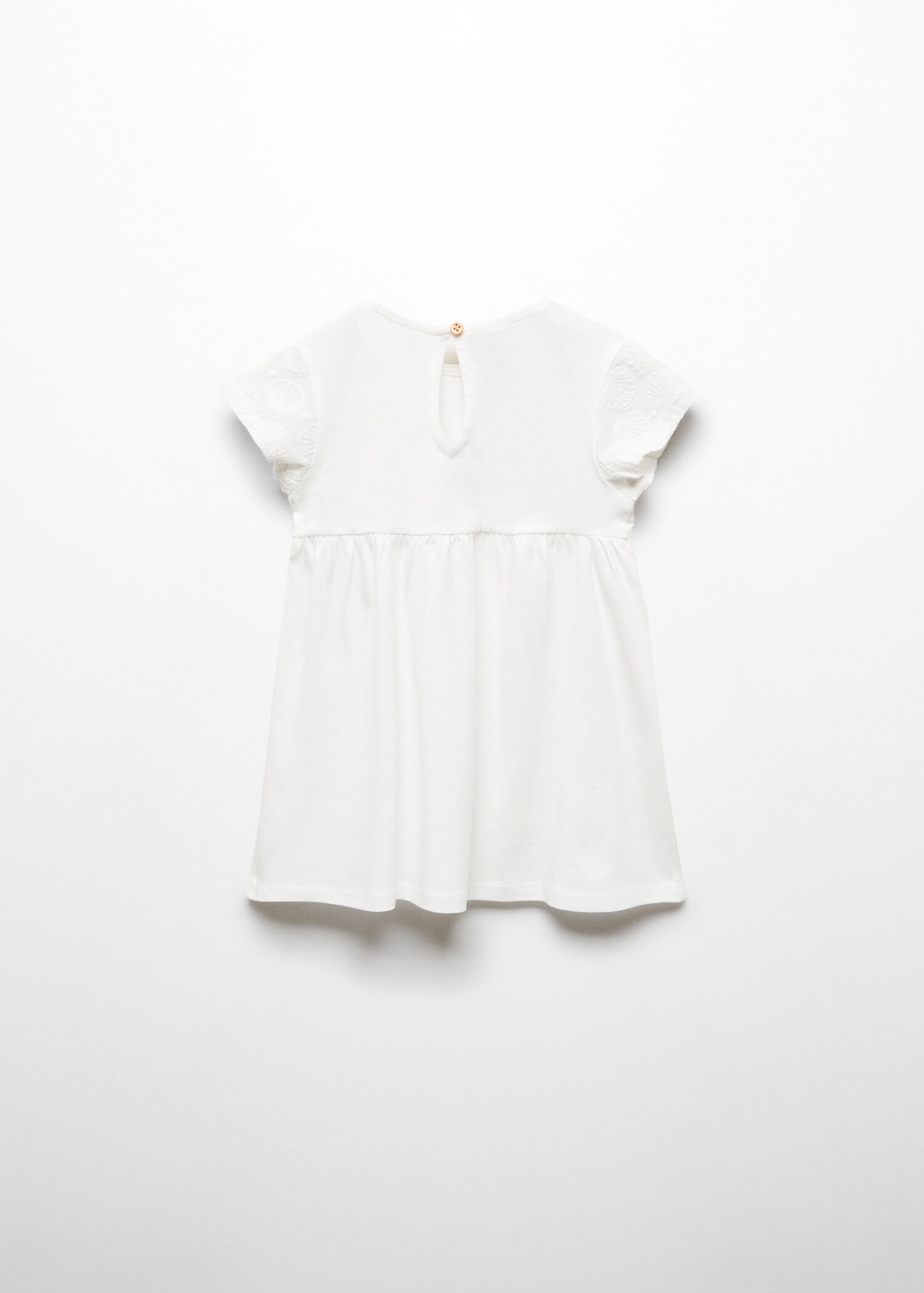 Vestit estampat brodat - Revers de l'article