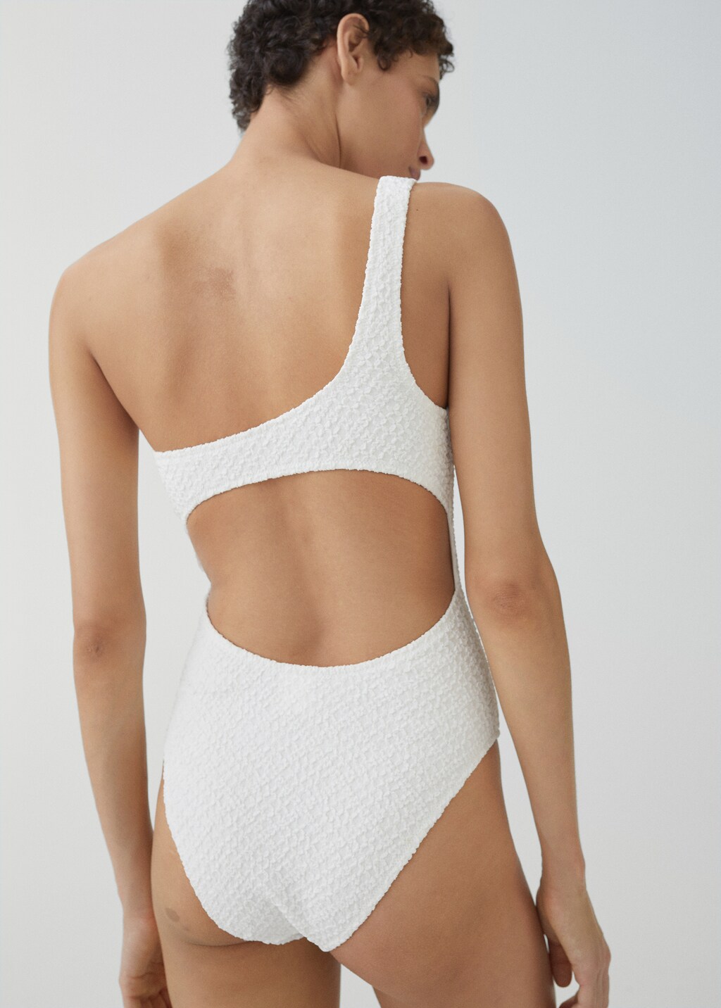 Asymmetrical textured swimsuit - Women | MANGO OUTLET USA