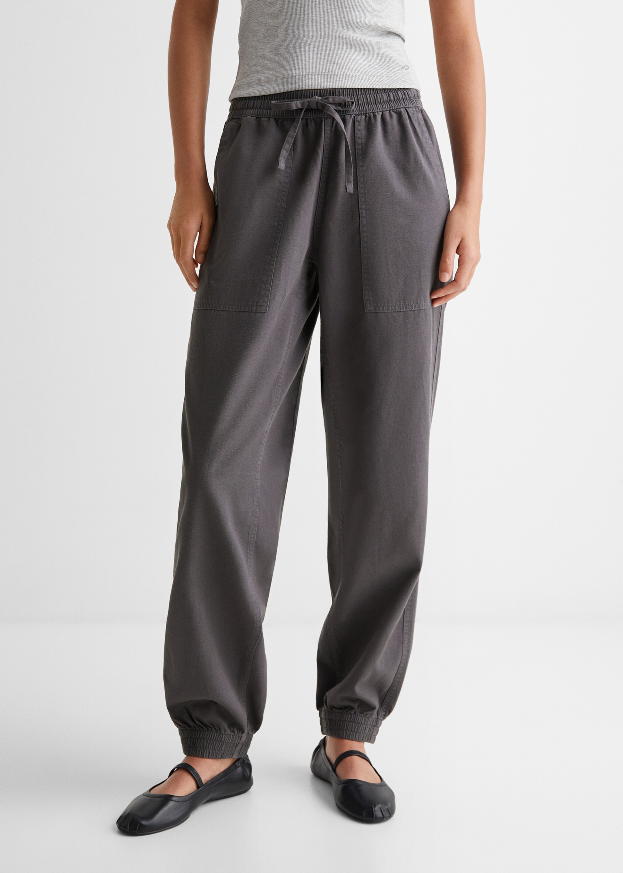 Cotton jogger-style trousers - Details of the article 6, Charcoal. Ref: 67035154-00.