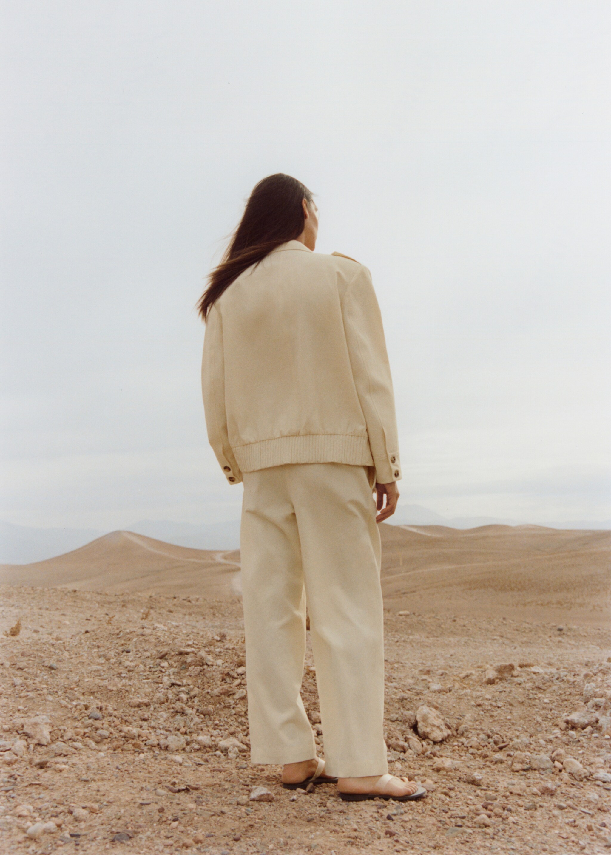 Crossed pleated trousers - Details of the article 7
