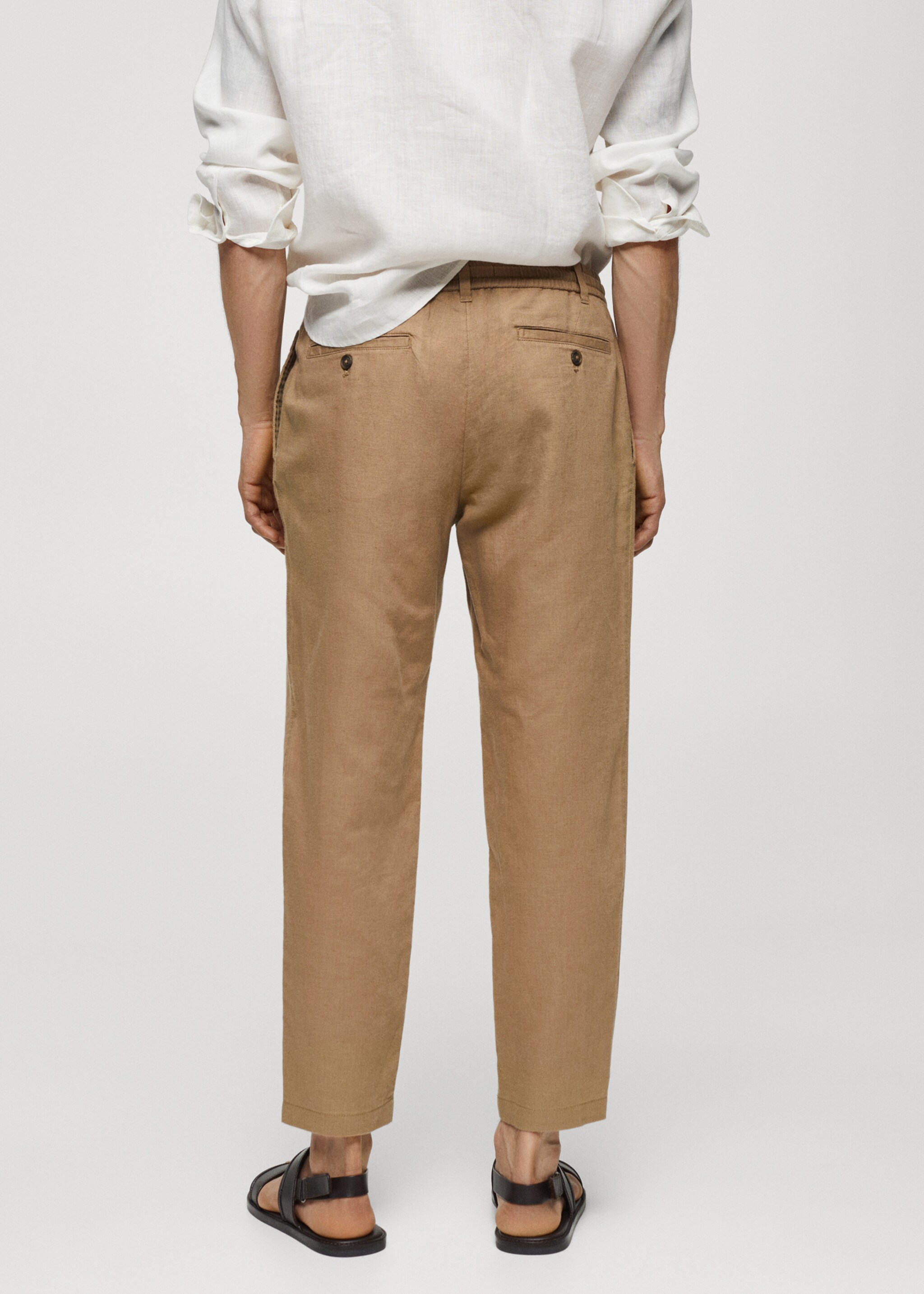 Slim-fit trousers with drawstring - Reverse of the article