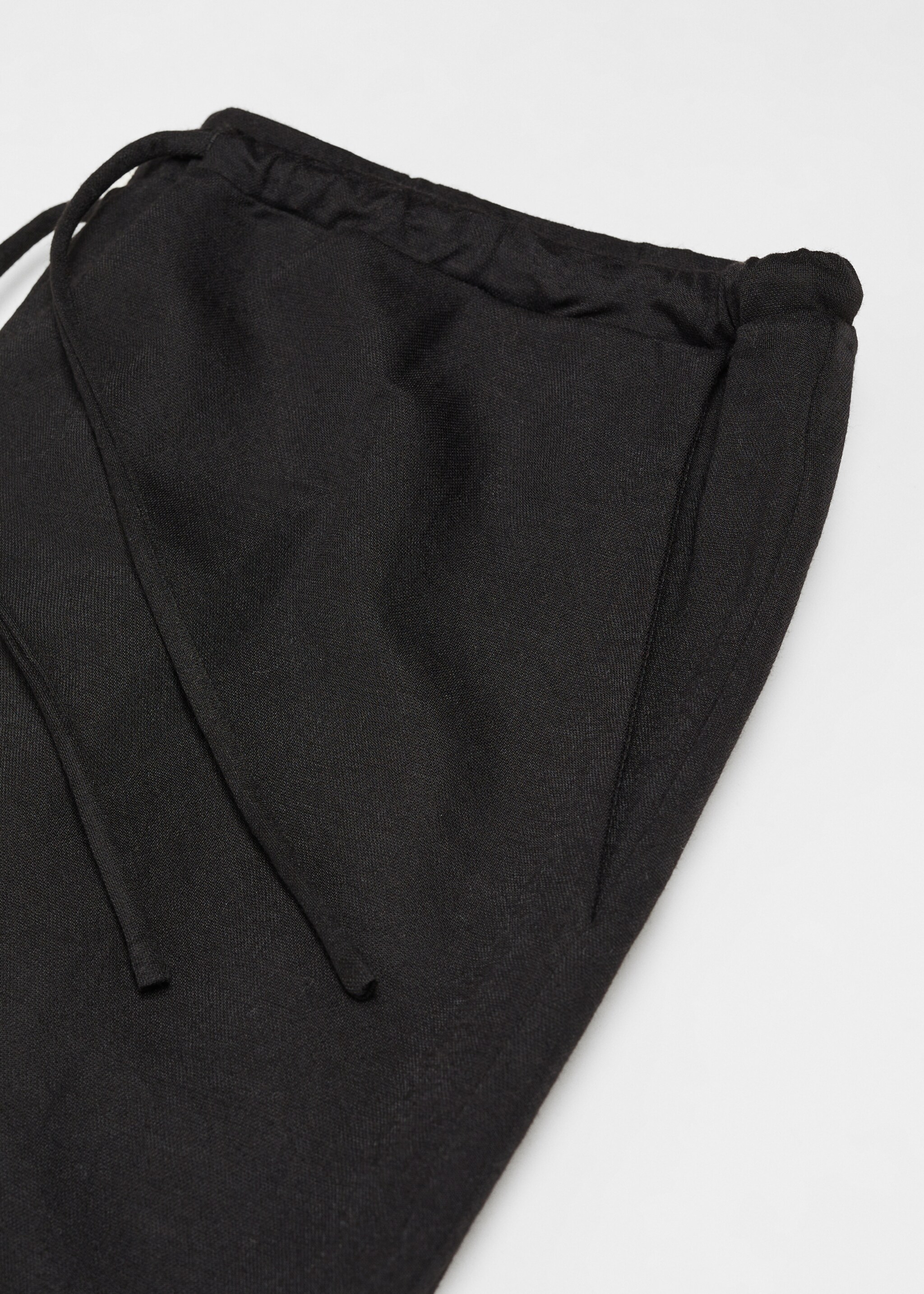 Wideleg trousers with elastic waist - Details of the article 8, Black. Ref: 67036740-00.