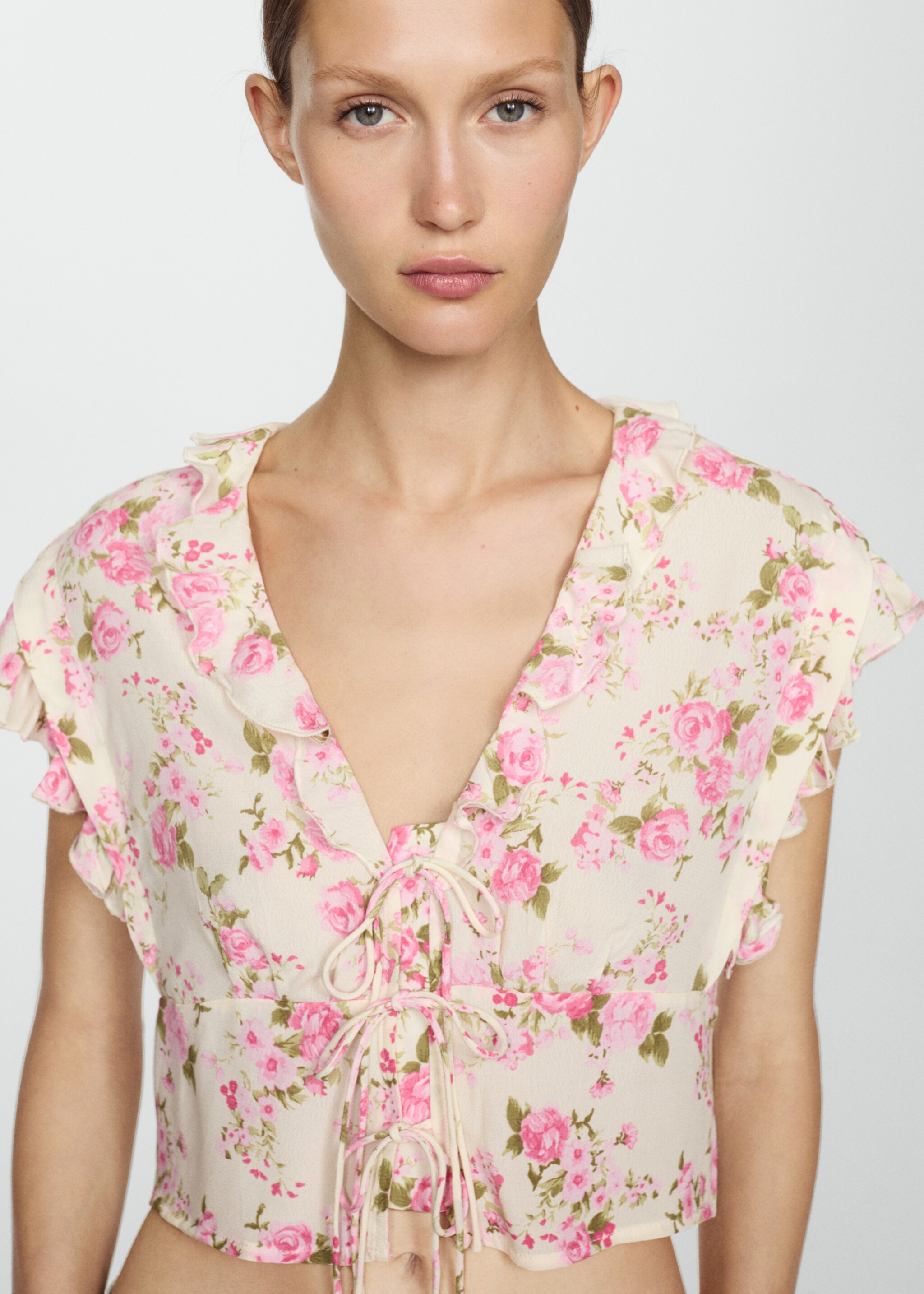 Florale Bluse mit Schleifenverschluss - Detail des Artikels 1