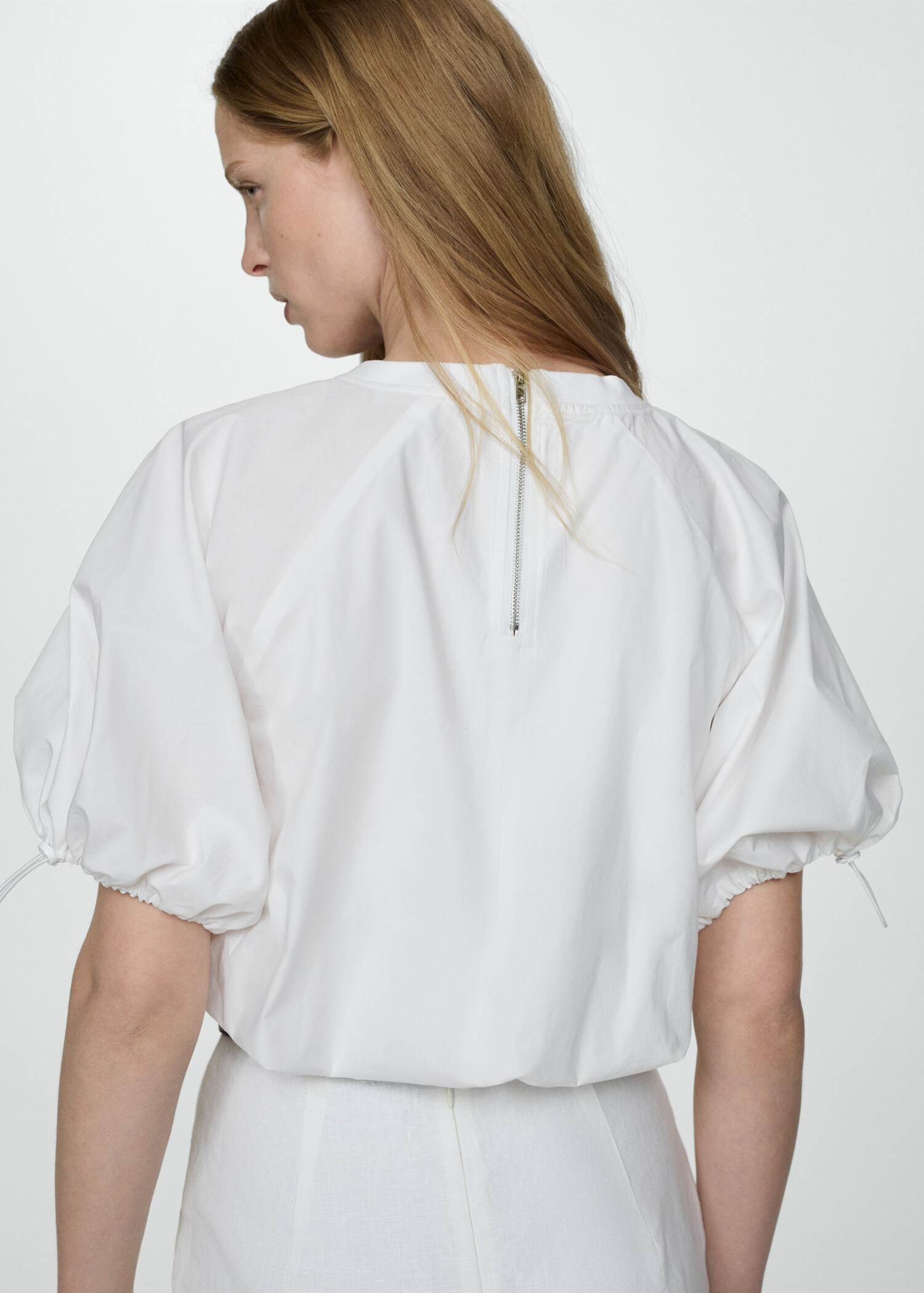 Puffed sleeves blouse - Reverse of the article
