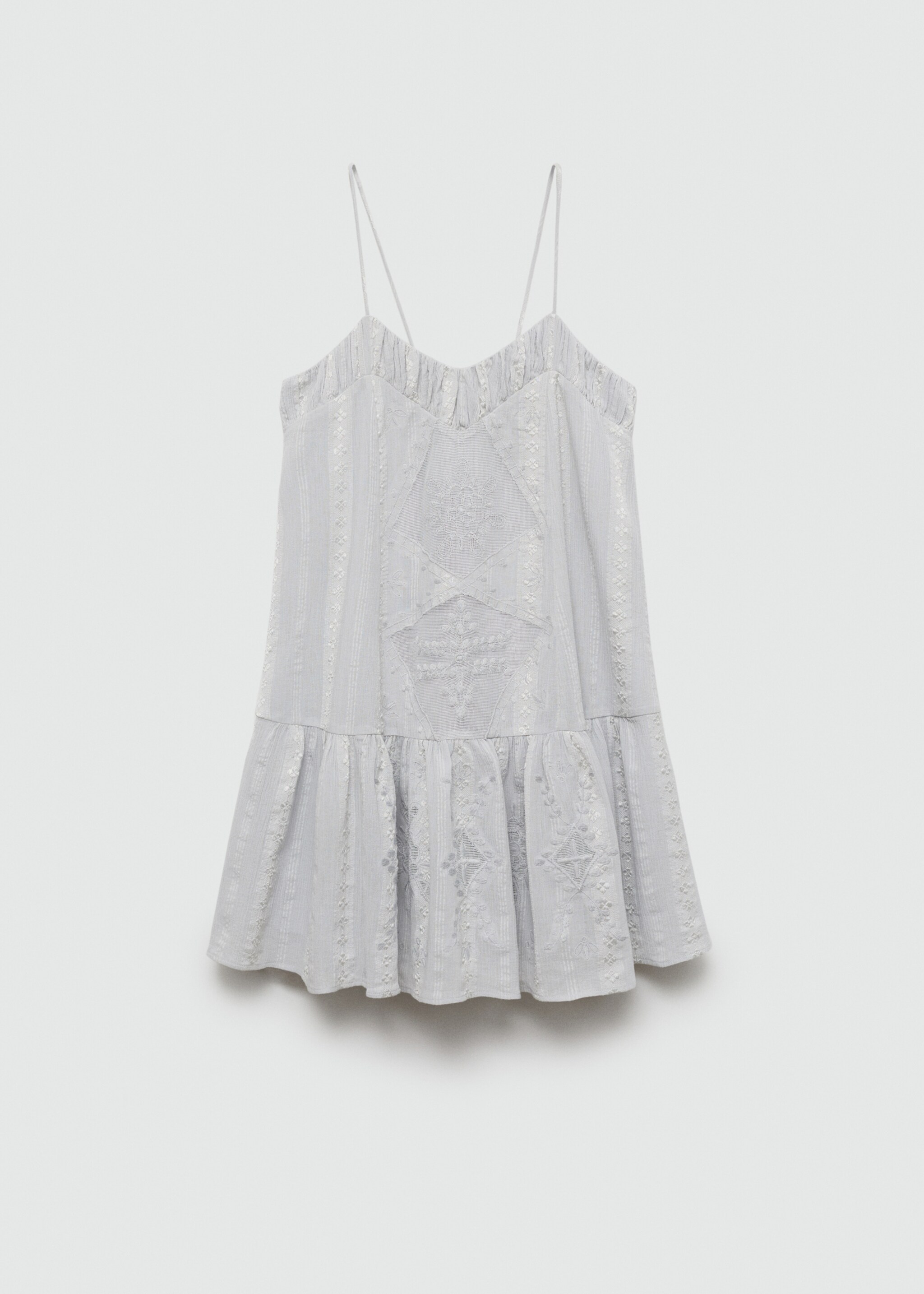 Robe brodée détail pompons - Article sans modèle