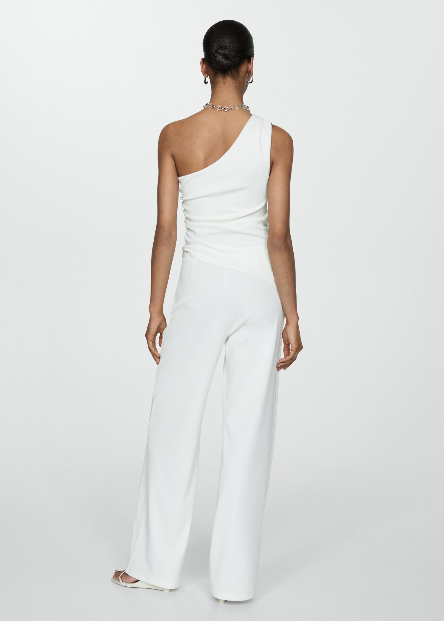 Asymmetrisk draperad topp - Artikelns baksida