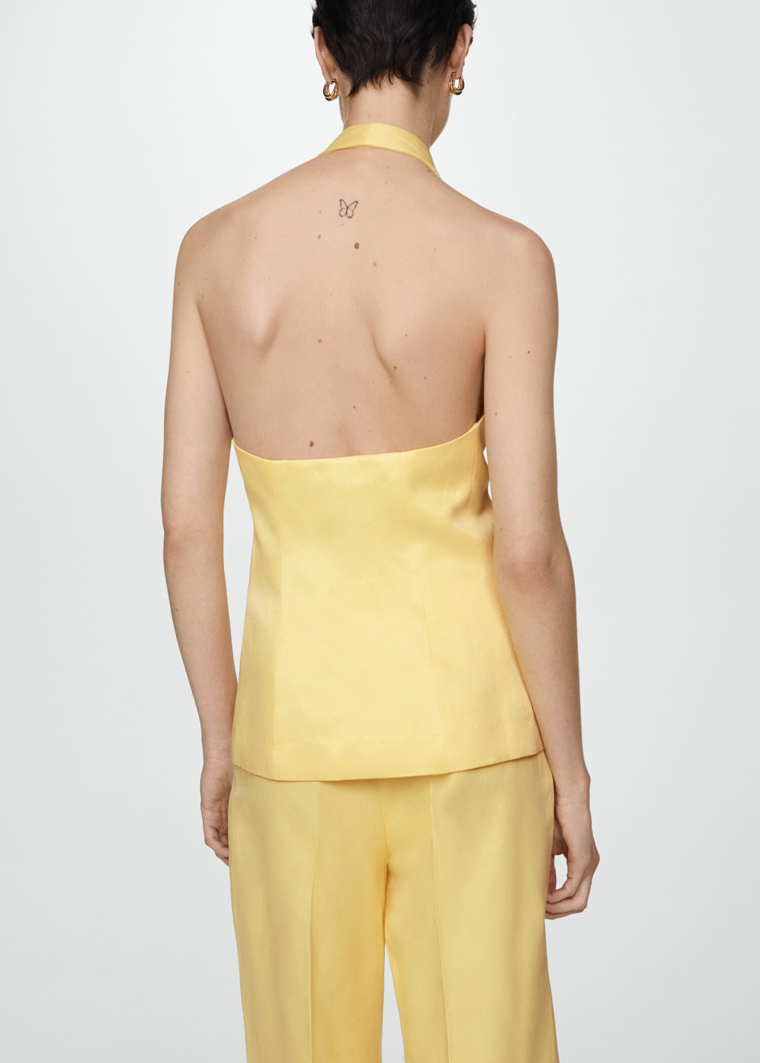 Halter-neck gilet with buttons - Reverse of the article