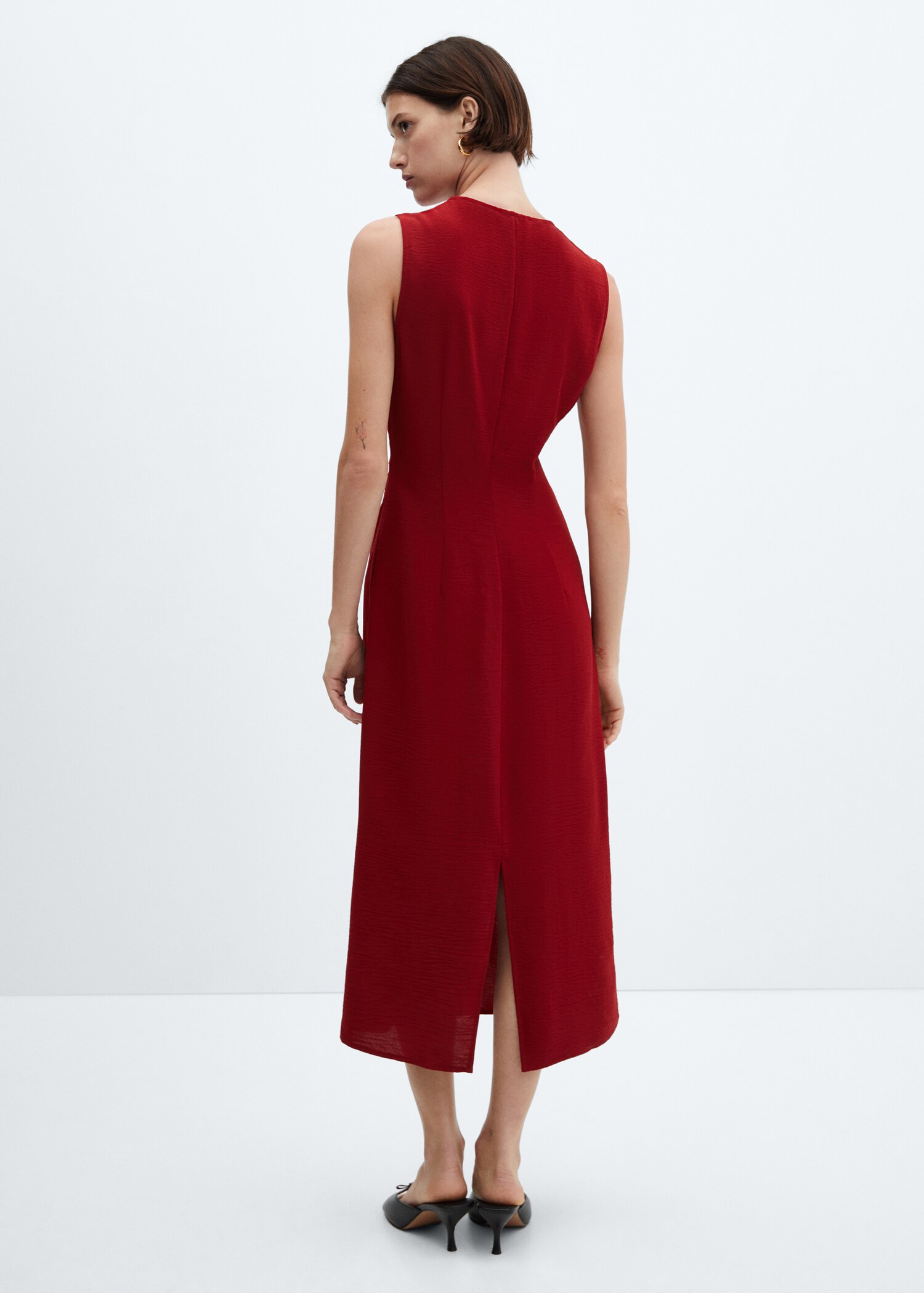Vestit detall nus - Revers de l'article