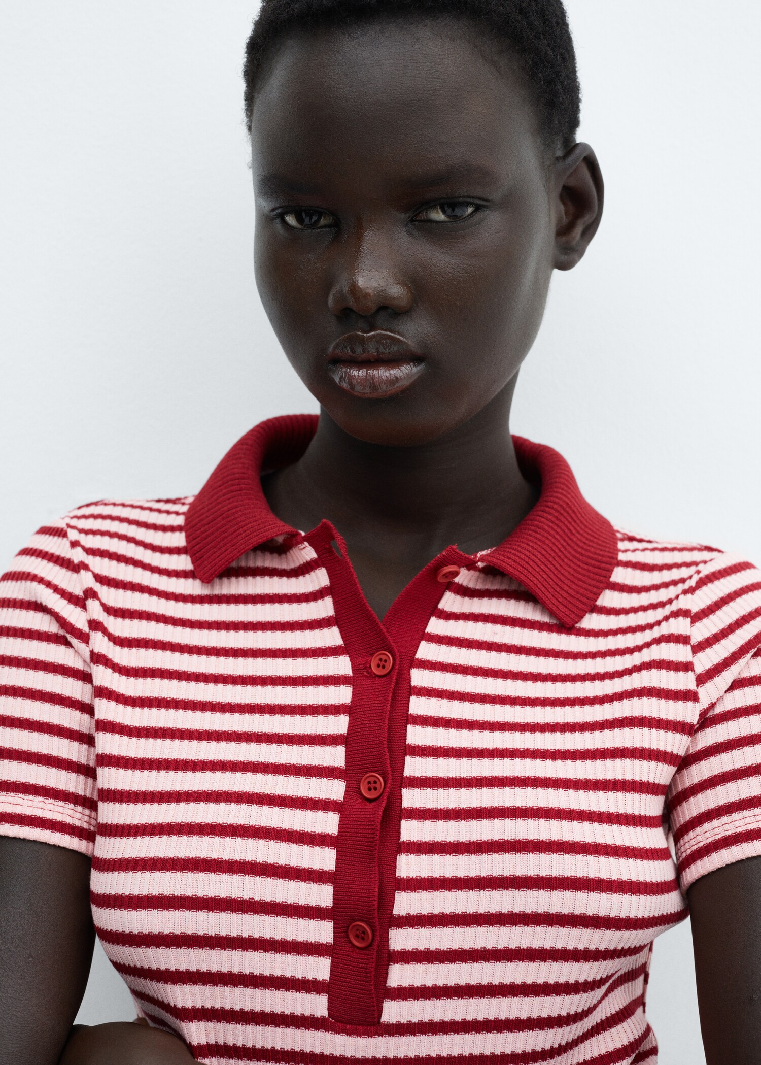 Short-sleeved striped polo shirt - Details of the article 1