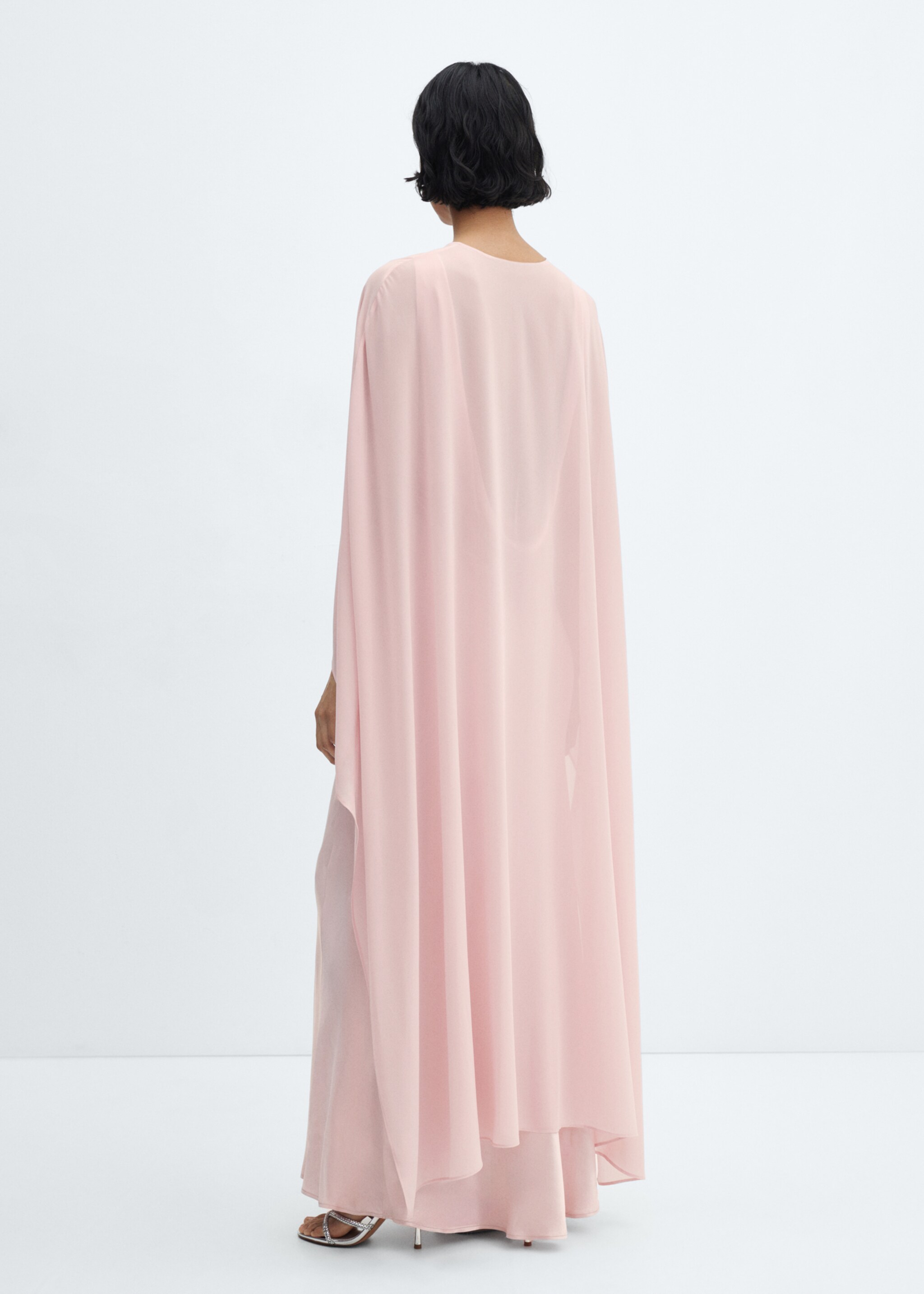 Asymmetric semi-transparent cape - Reverse of the article