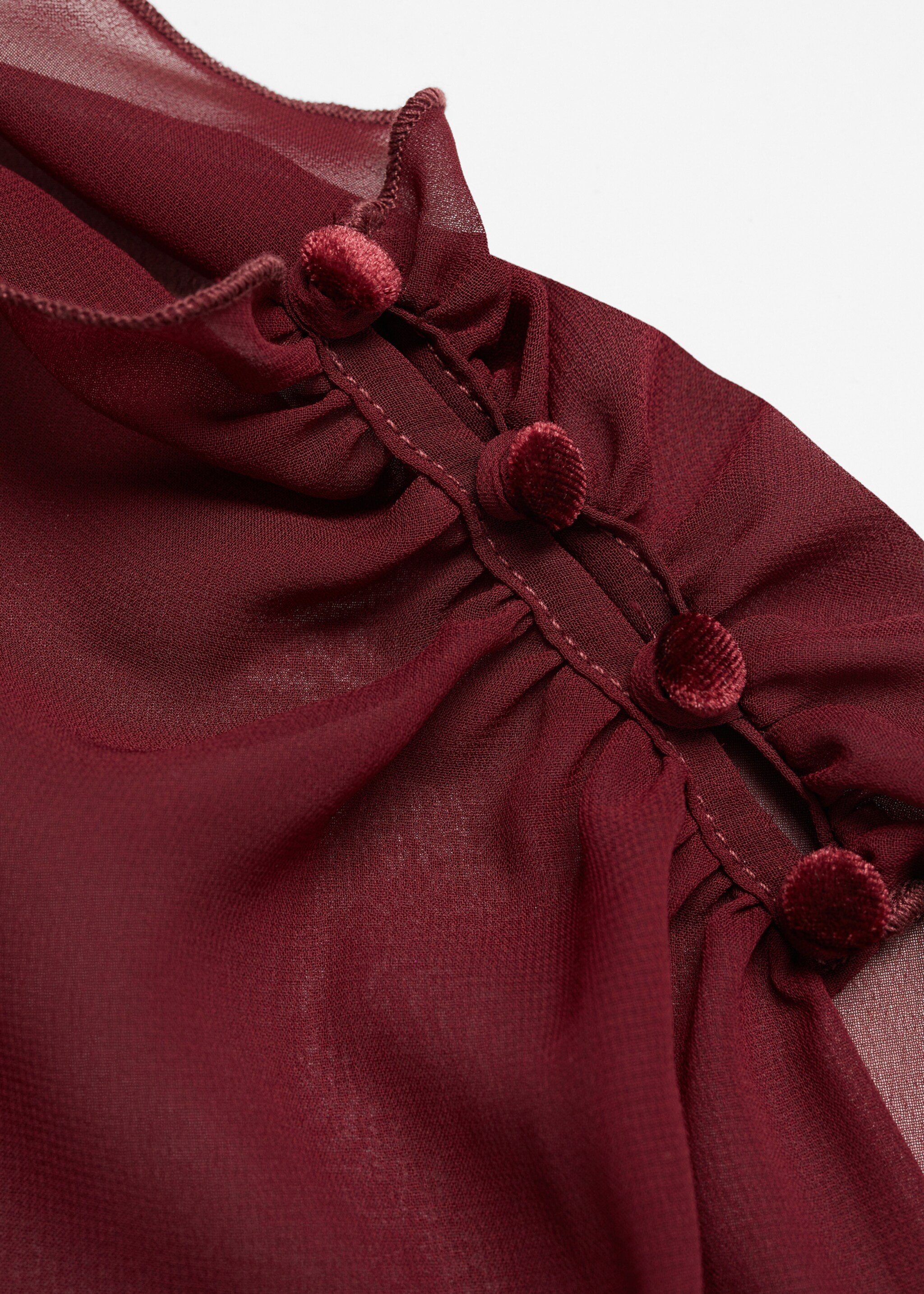Soepelvallende cape-blouse - Detail van het artikel 8