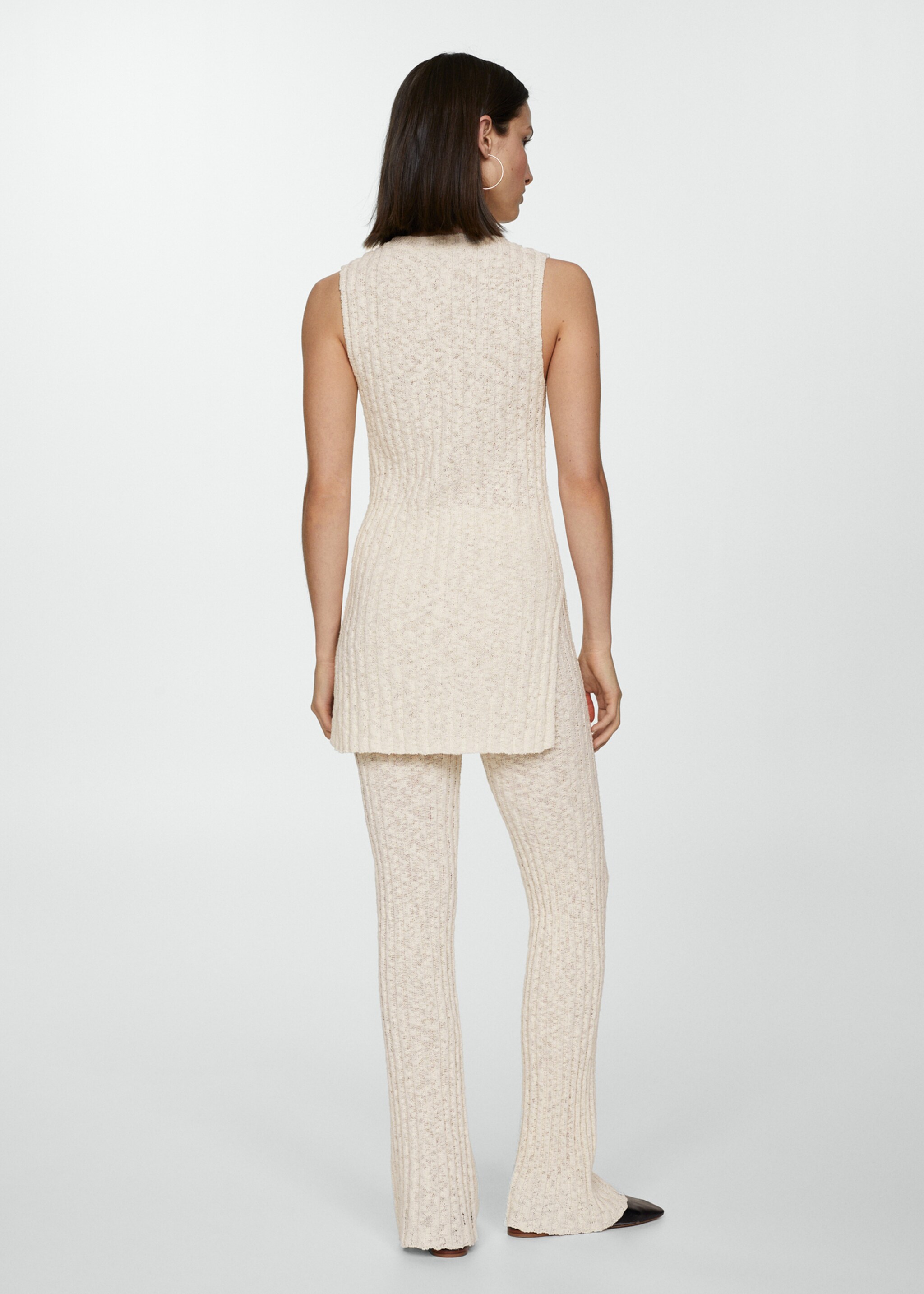 Ribbed knitted top with slits - Reverse of the article