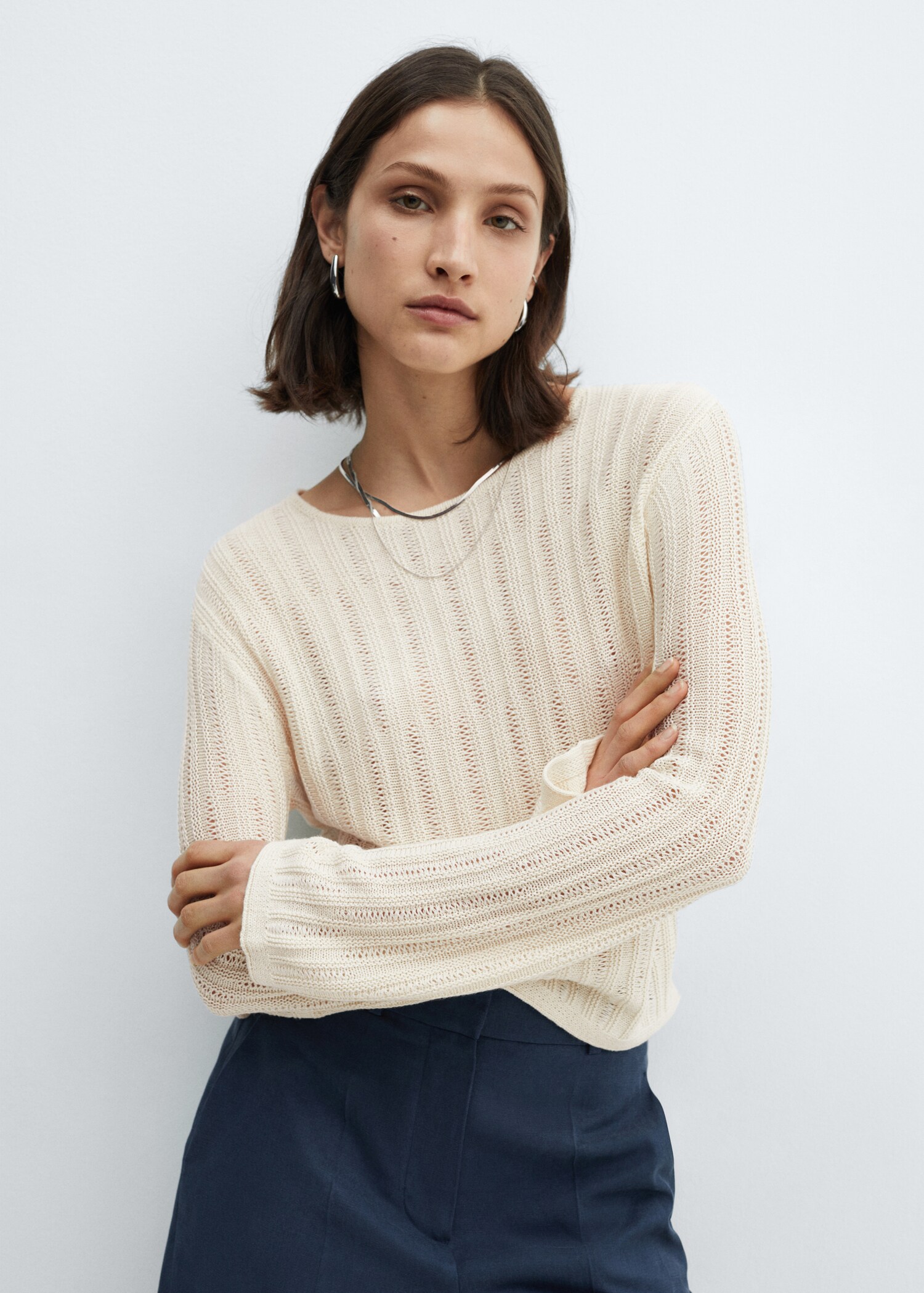 Flared-sleeve unstitched sweater - Medium plane