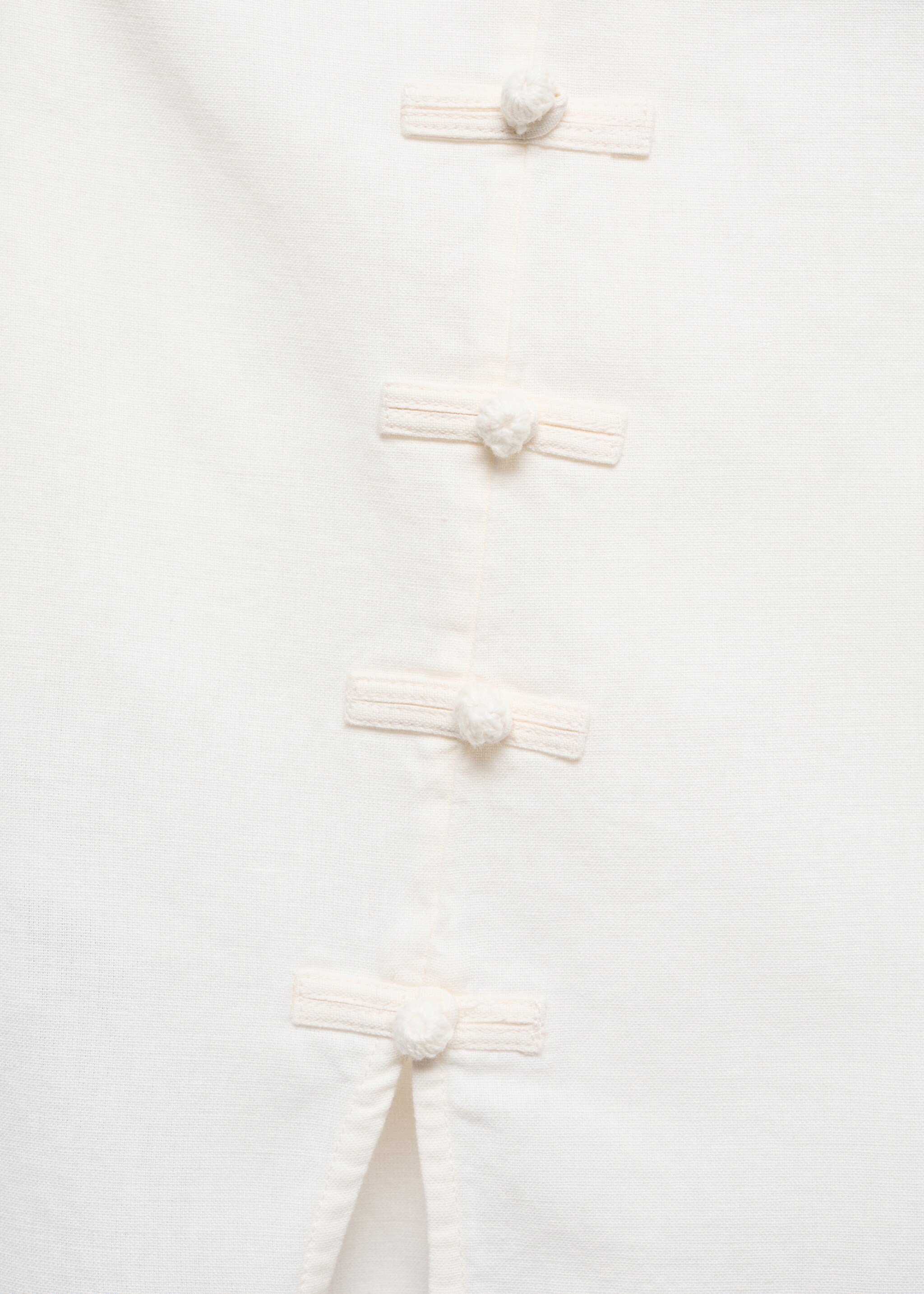 Mini-skirt with decorative buttons - Details of the article 8