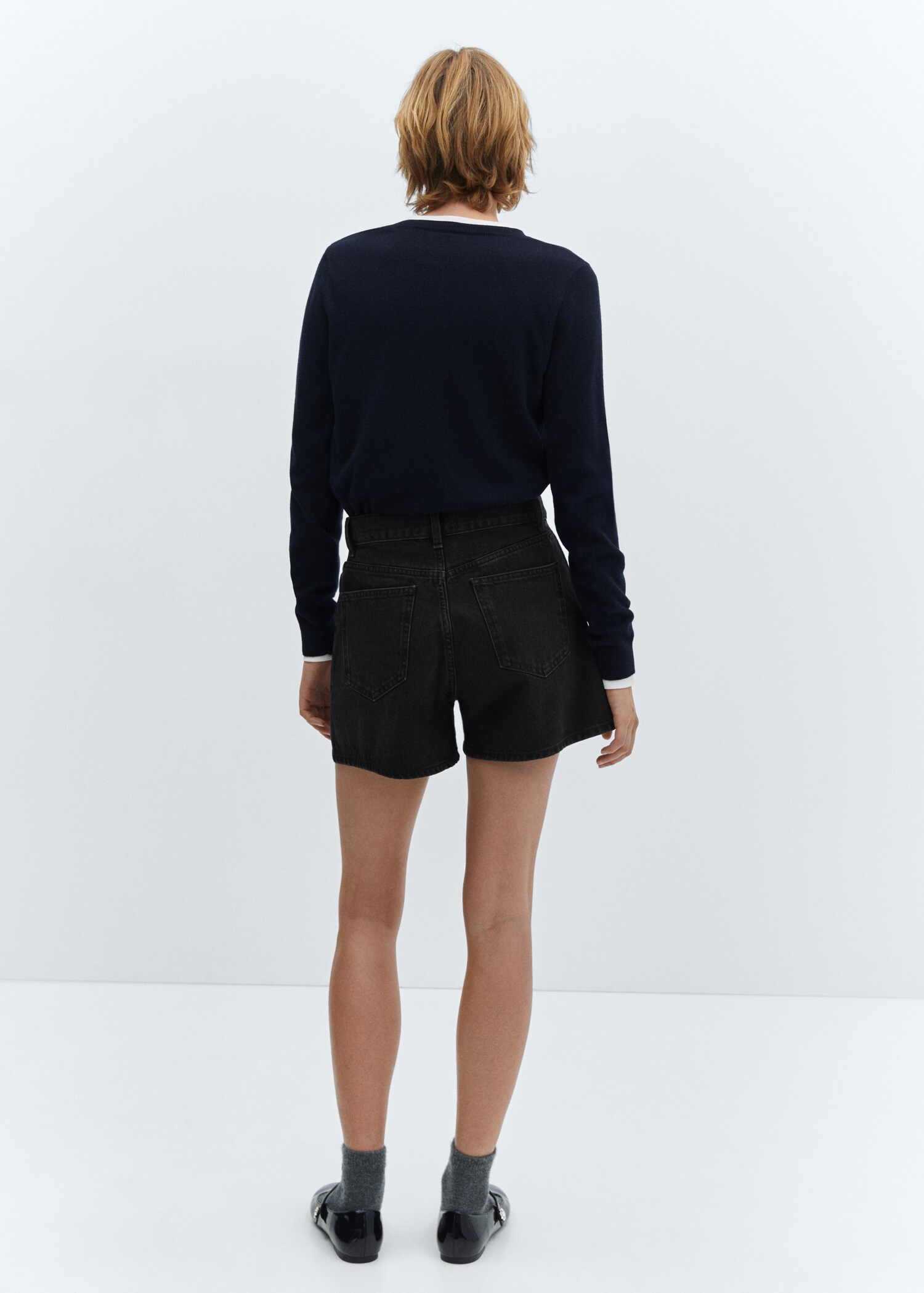 High-rise denim shorts - Reverse of the article