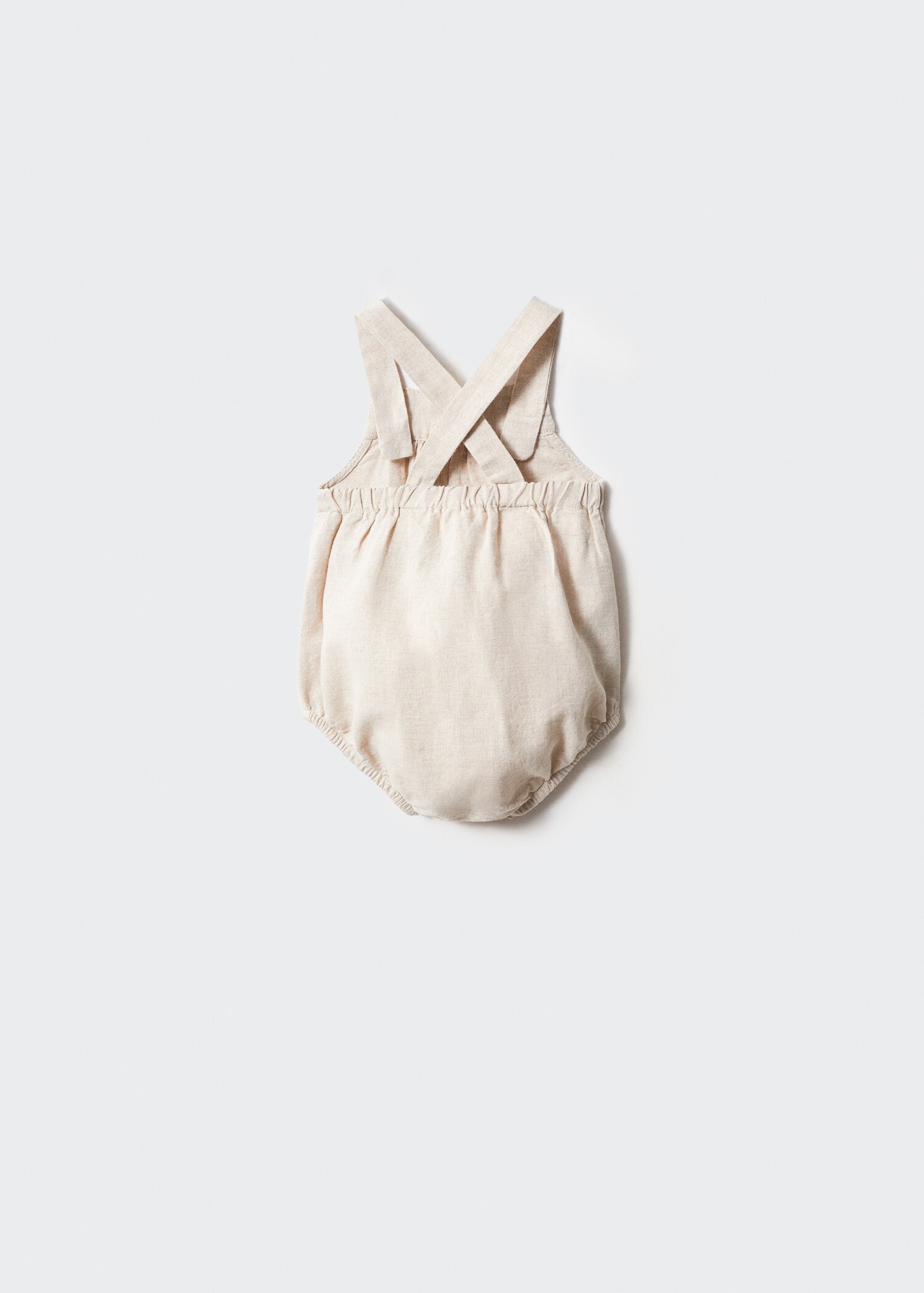 Linen romper - Reverse of the article