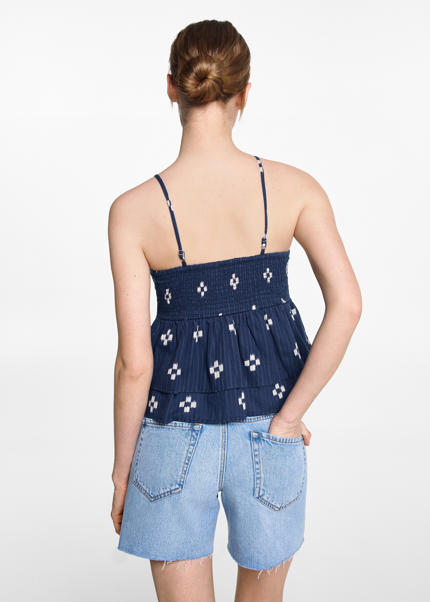 Top tirants frunzit - Revers de l'article
