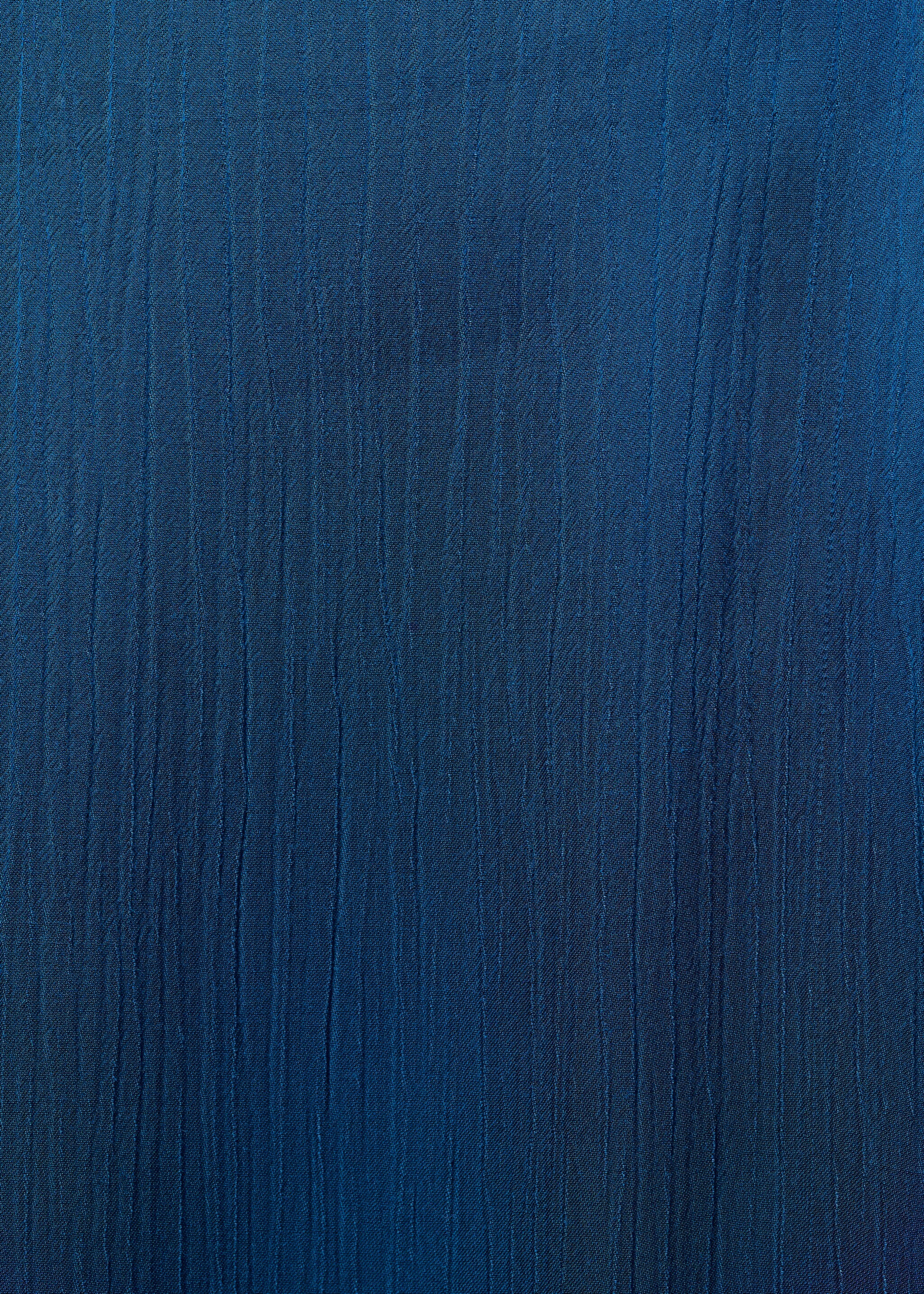 Utsvängd byxa - Detaljer om artikeln 8