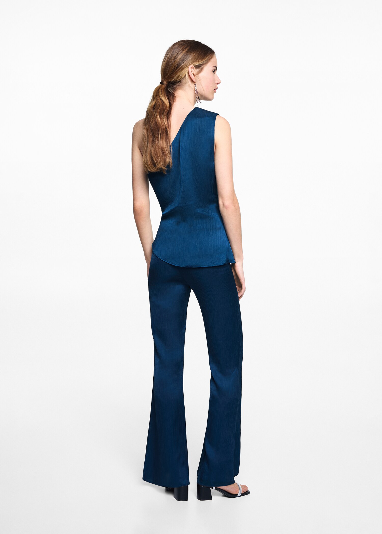 Flared trousers - Reverse of the article