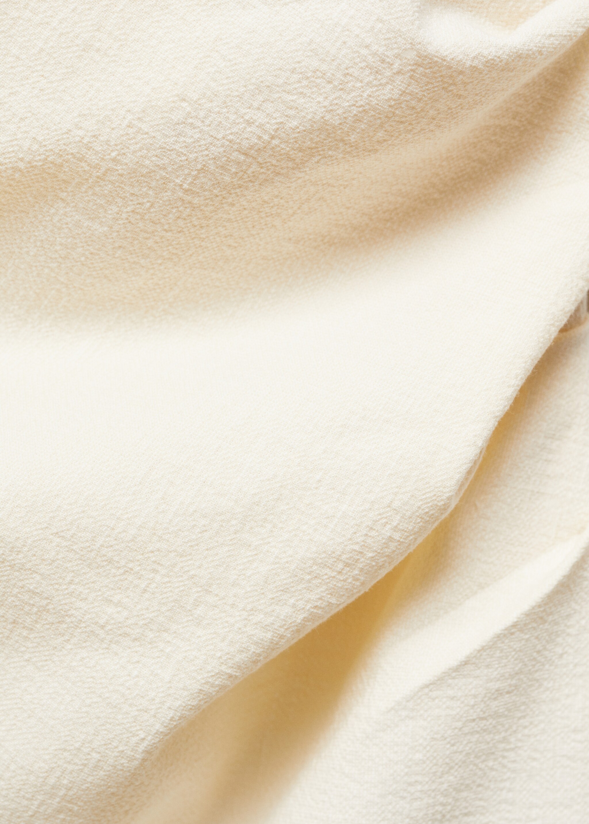 Asymmetrical textured top - Details of the article 8, Ecru. Ref: 67057121-00.