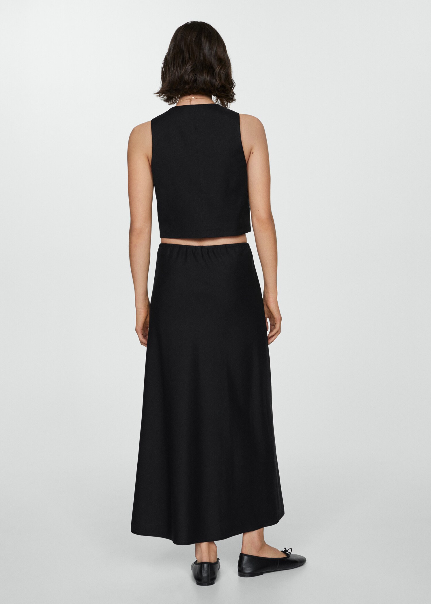 Long skirt with adjustable bow - Reverse of the article