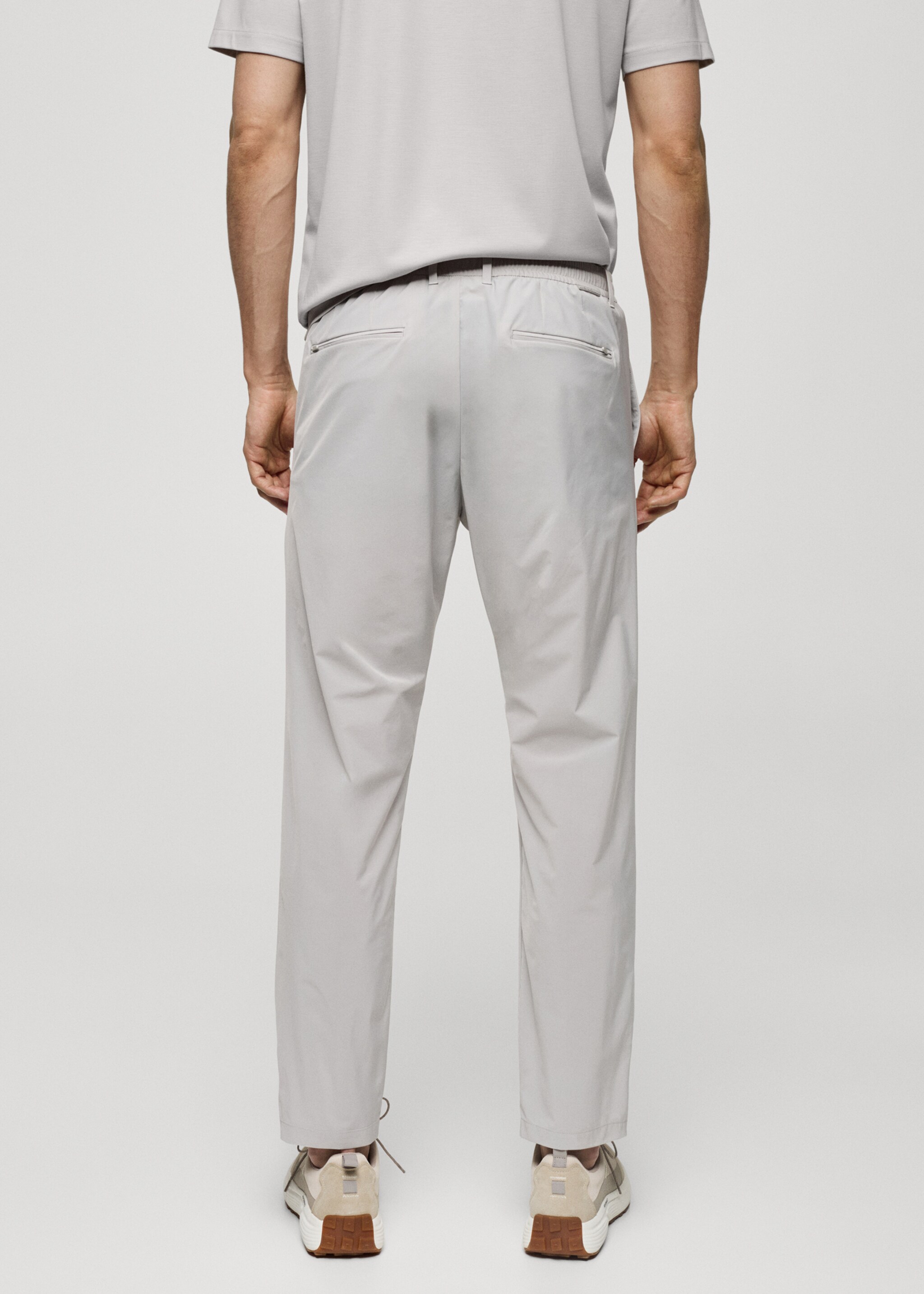 Water-repellent trousers with drawstring - Reverse of the article