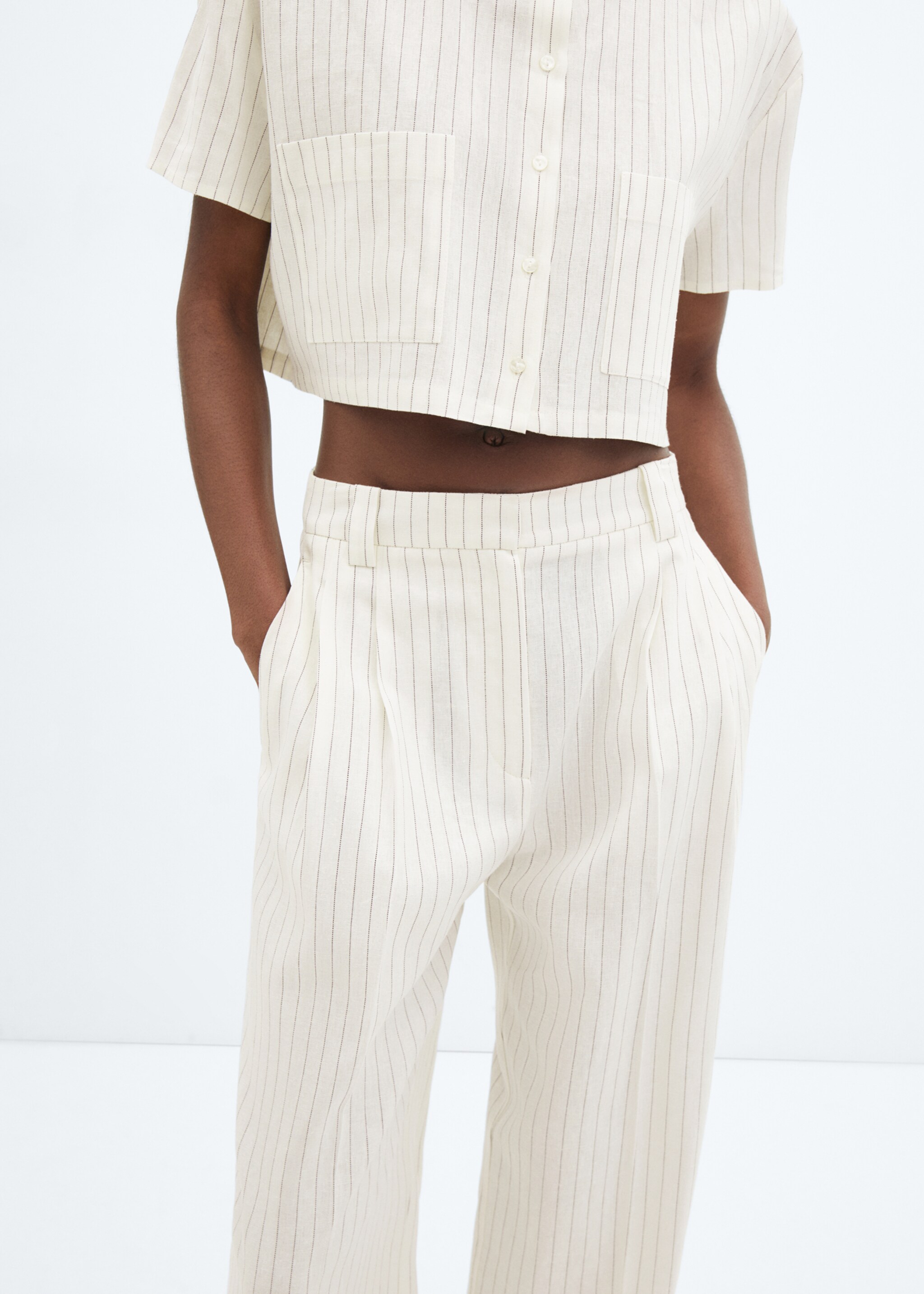 Pleated linen trousers - Details of the article 6, White. Ref: 67060435-00.