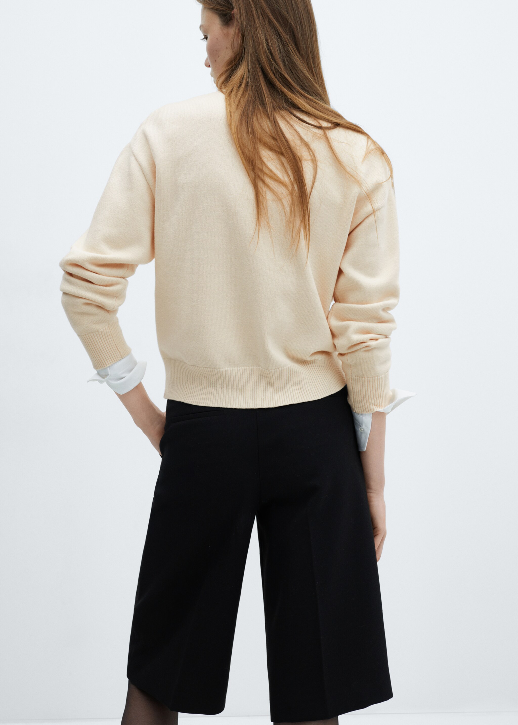 Knitted buttoned jacket - Reverse of the article