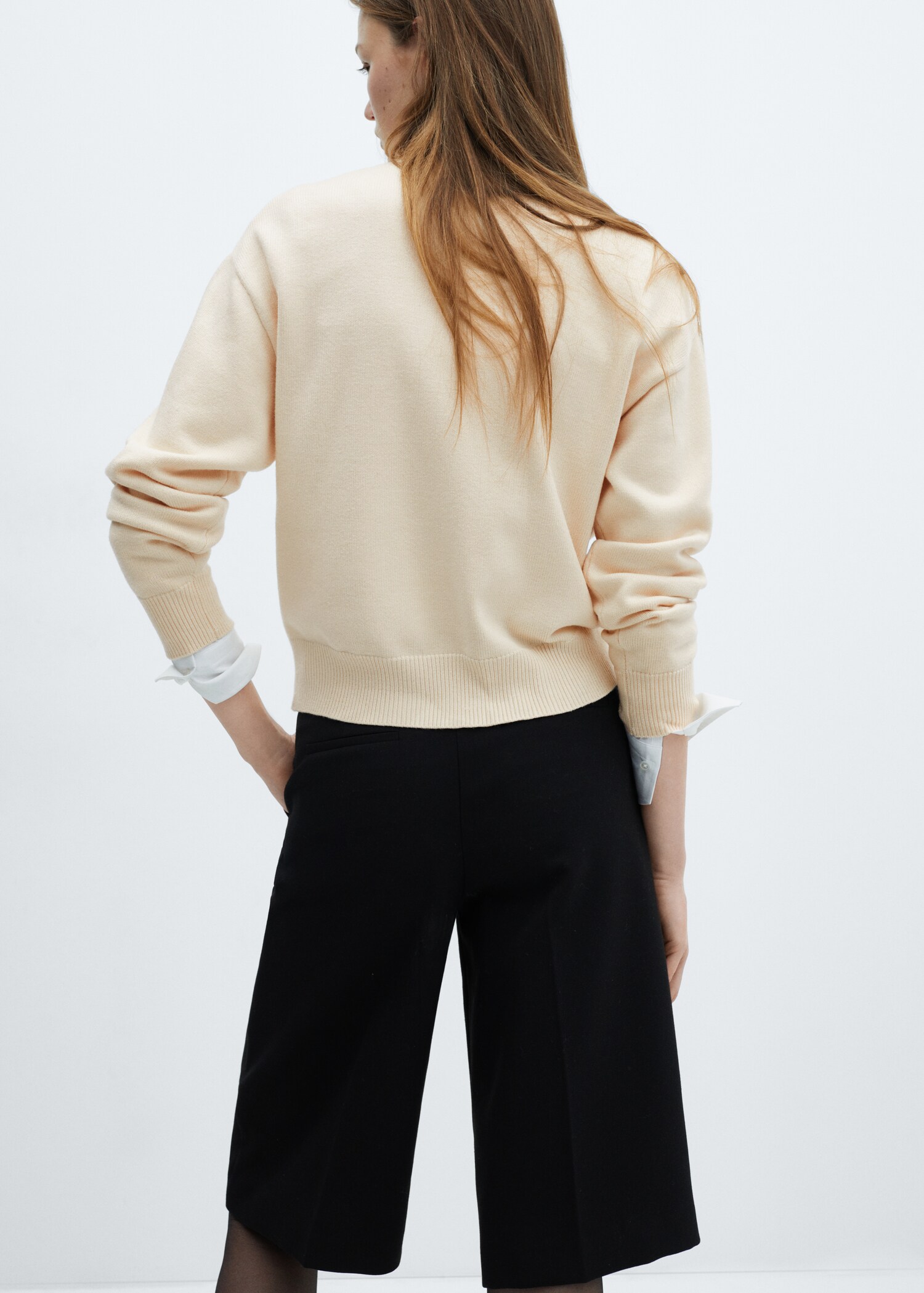 Knitted buttoned jacket - Reverse of the article