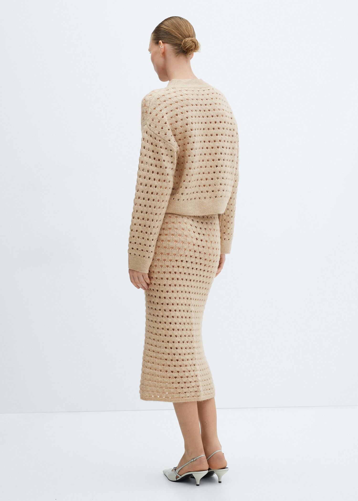 Knitted skirt with openwork details - Reverse of the article