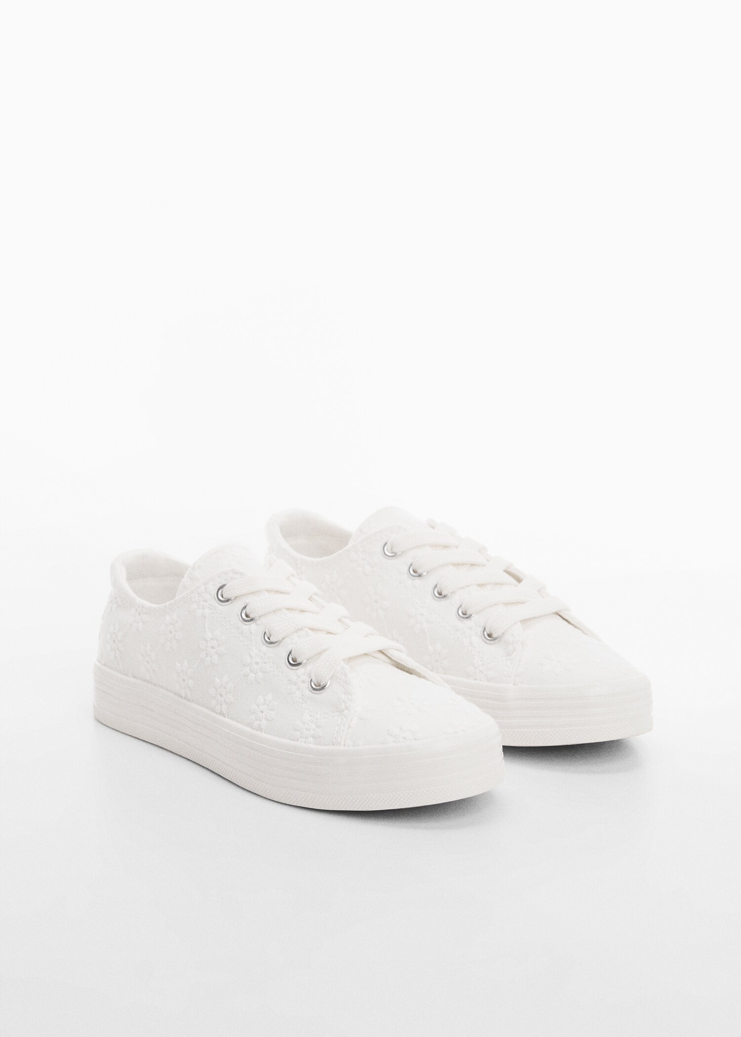 Broderade sneakers - Bild av mittparti