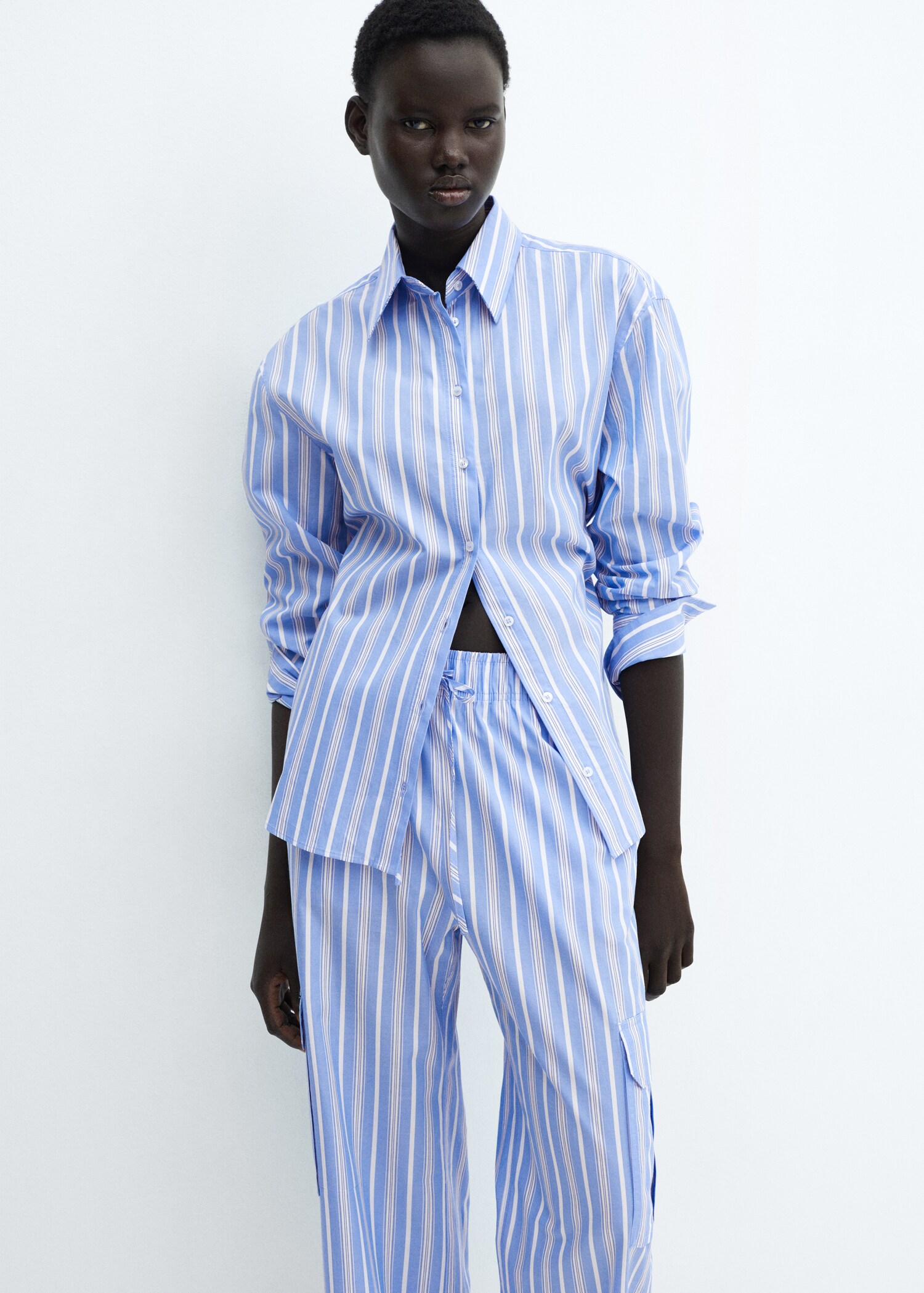 Striped cotton cargo trousers - Details of the article 1