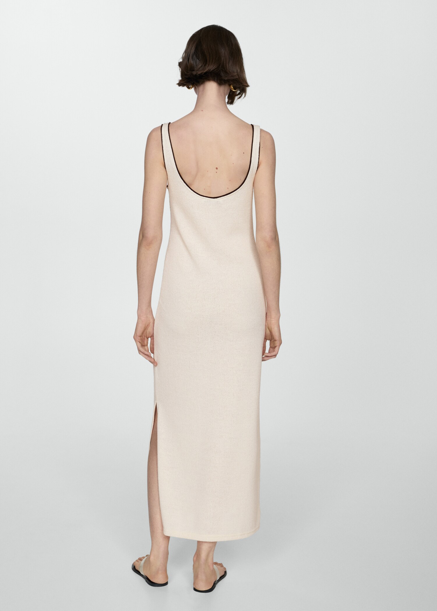 Vestit punt obertura - Revers de l'article