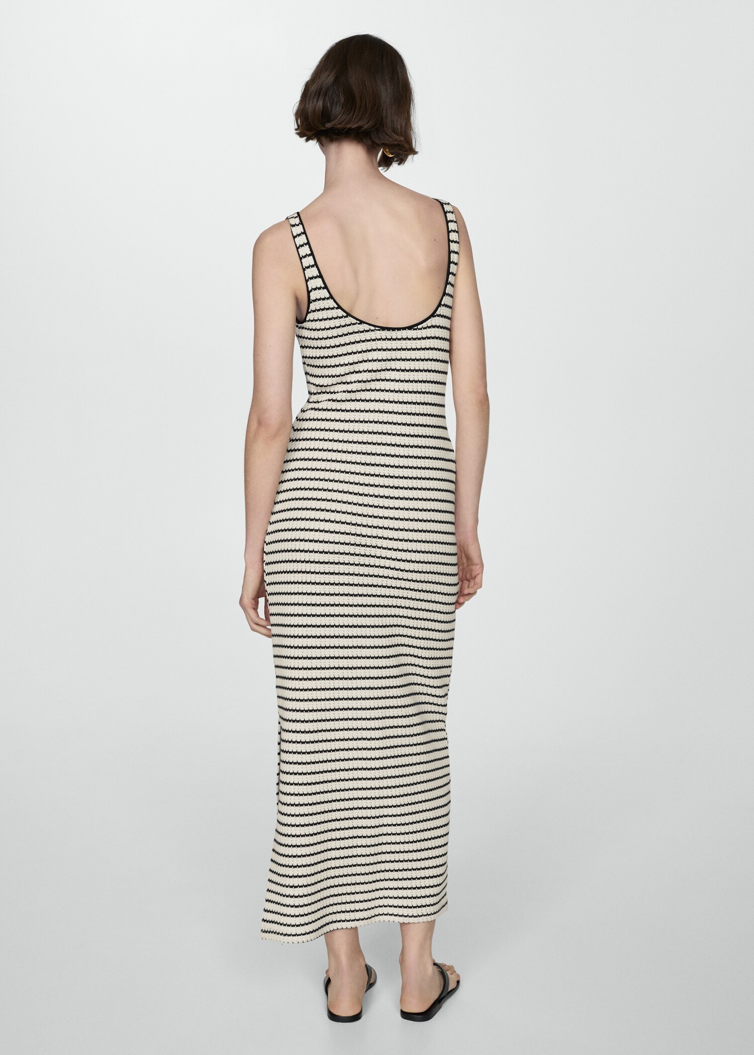 Vestit punt obertura - Revers de l'article