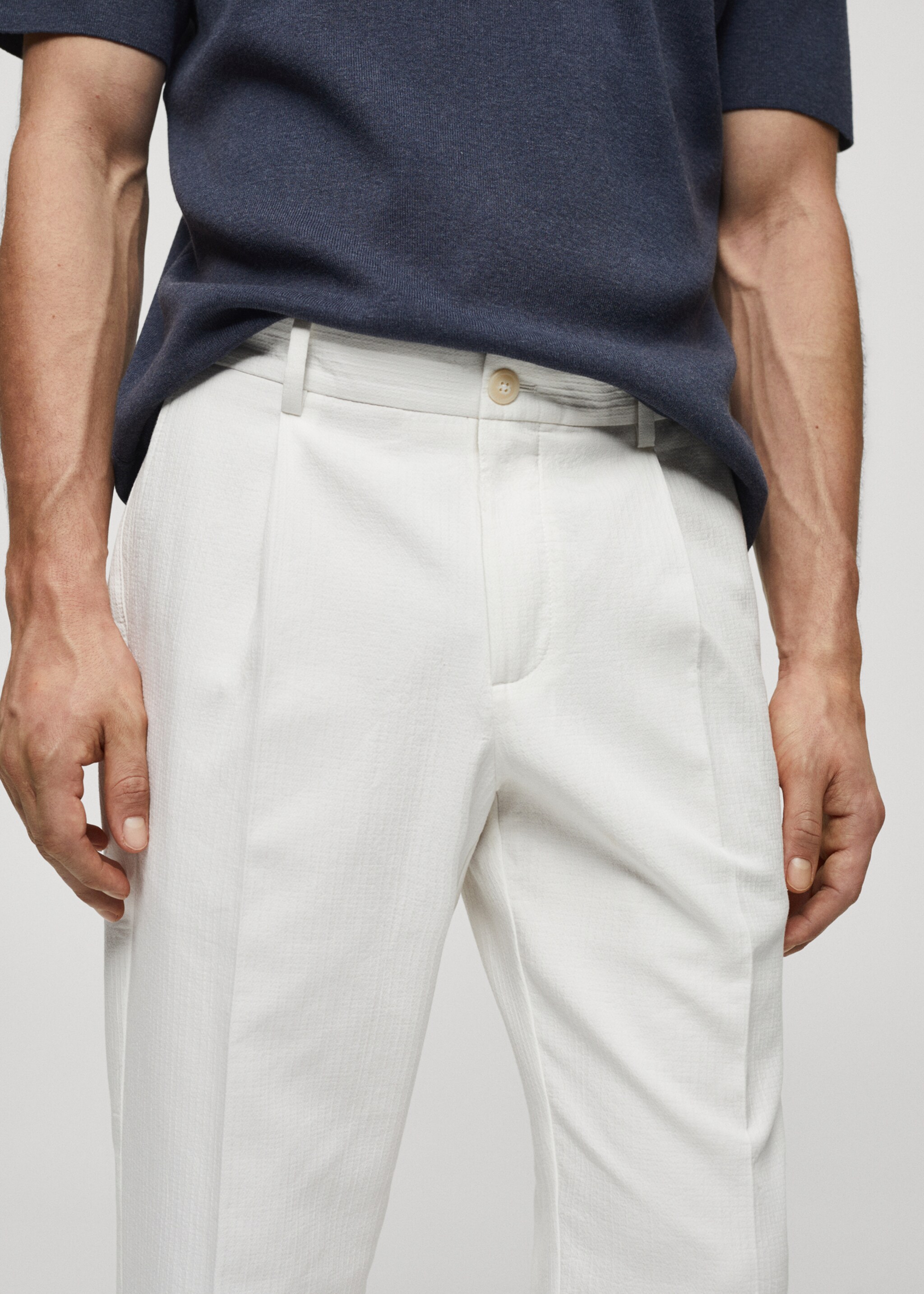 Slim-fit trousers with pleated texture - Details of the article 1
