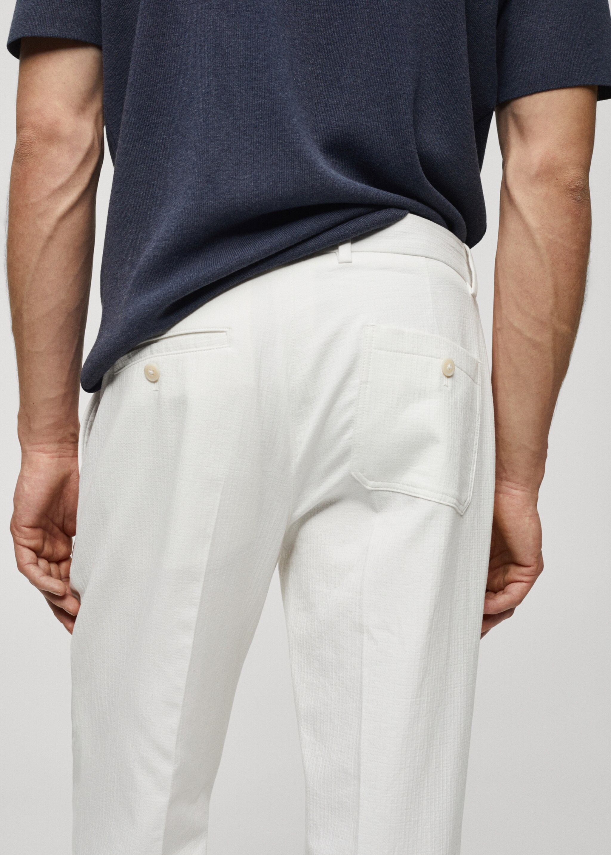 Slim-fit trousers with pleated texture - Details of the article 4
