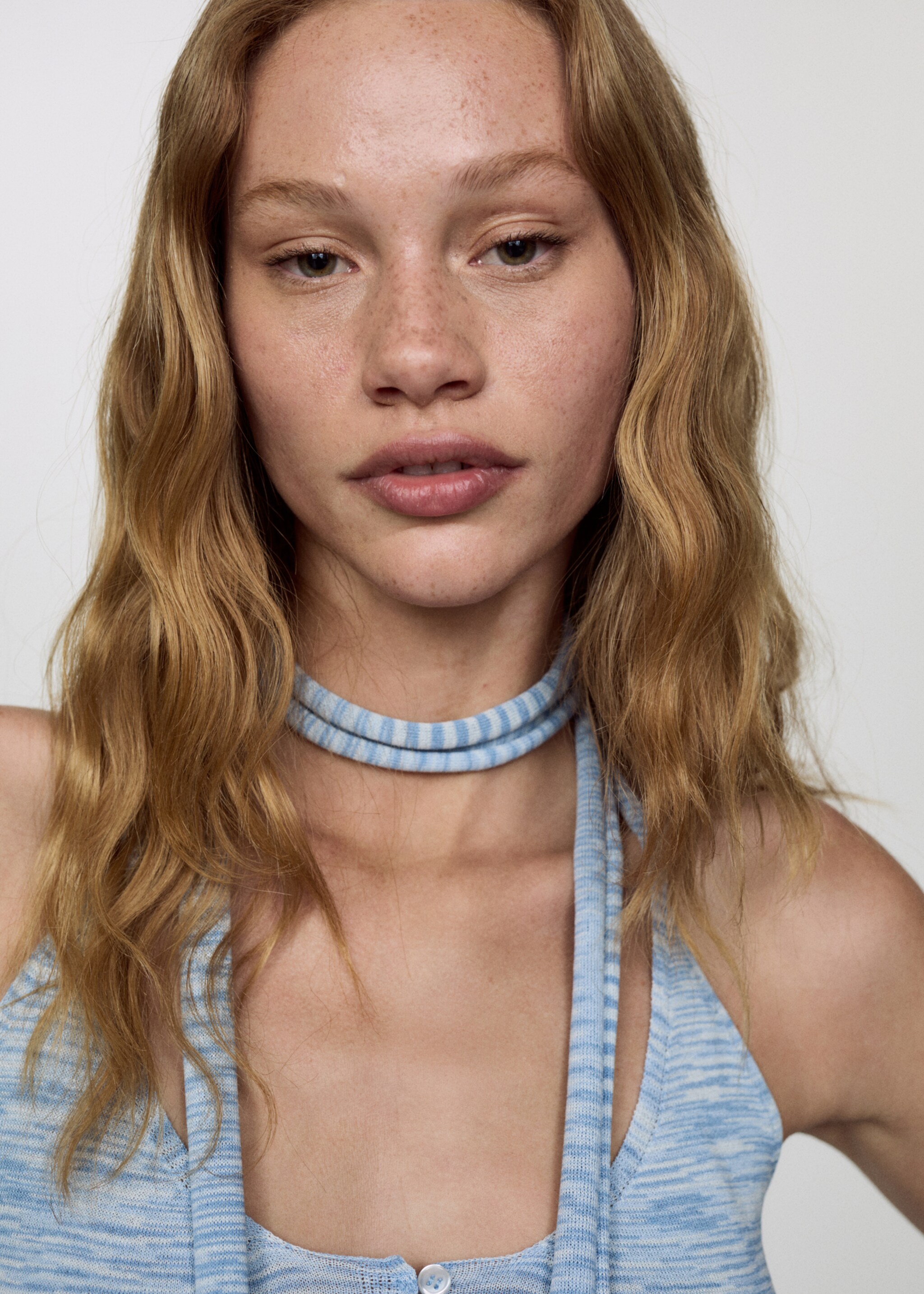 Halter-neck top with buttons - Details of the article 1, Sky Blue. Ref: 67069604-00.