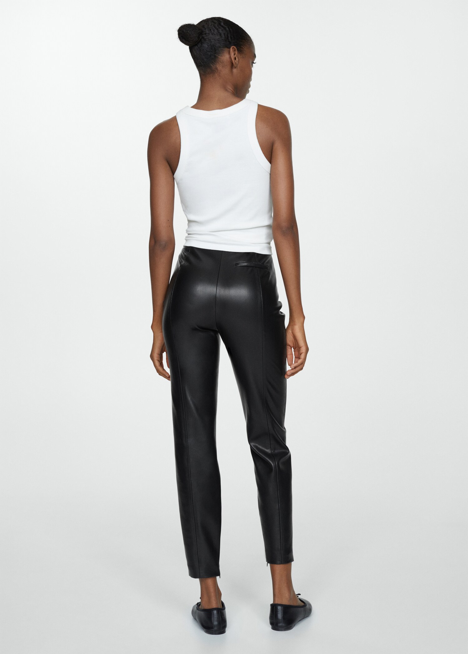 Leather-effect leggings with split hems - Reverse of the article