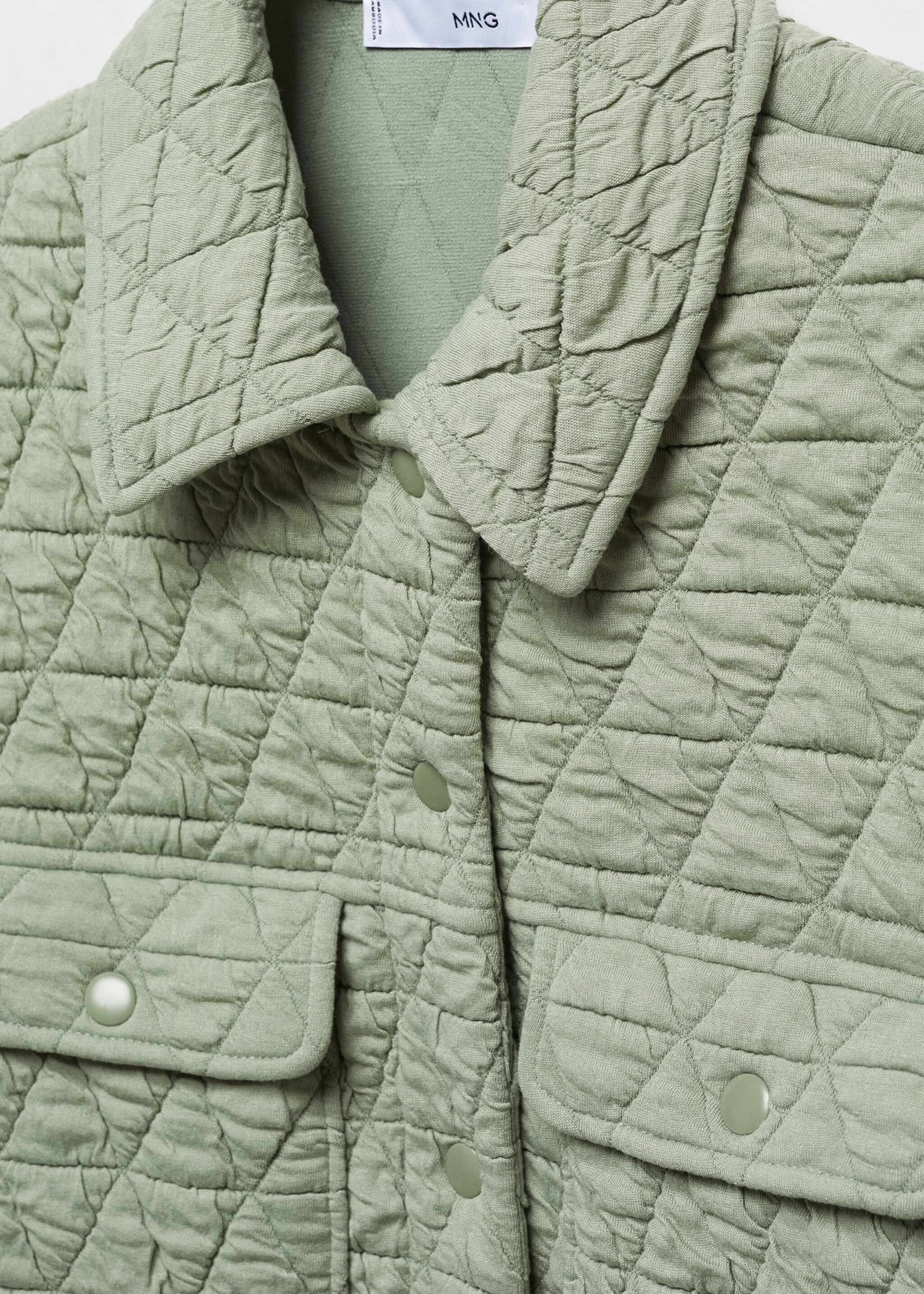 Quilted gilet with buttons - Details of the article 8, Pastel Green. Ref: 67074034-00.