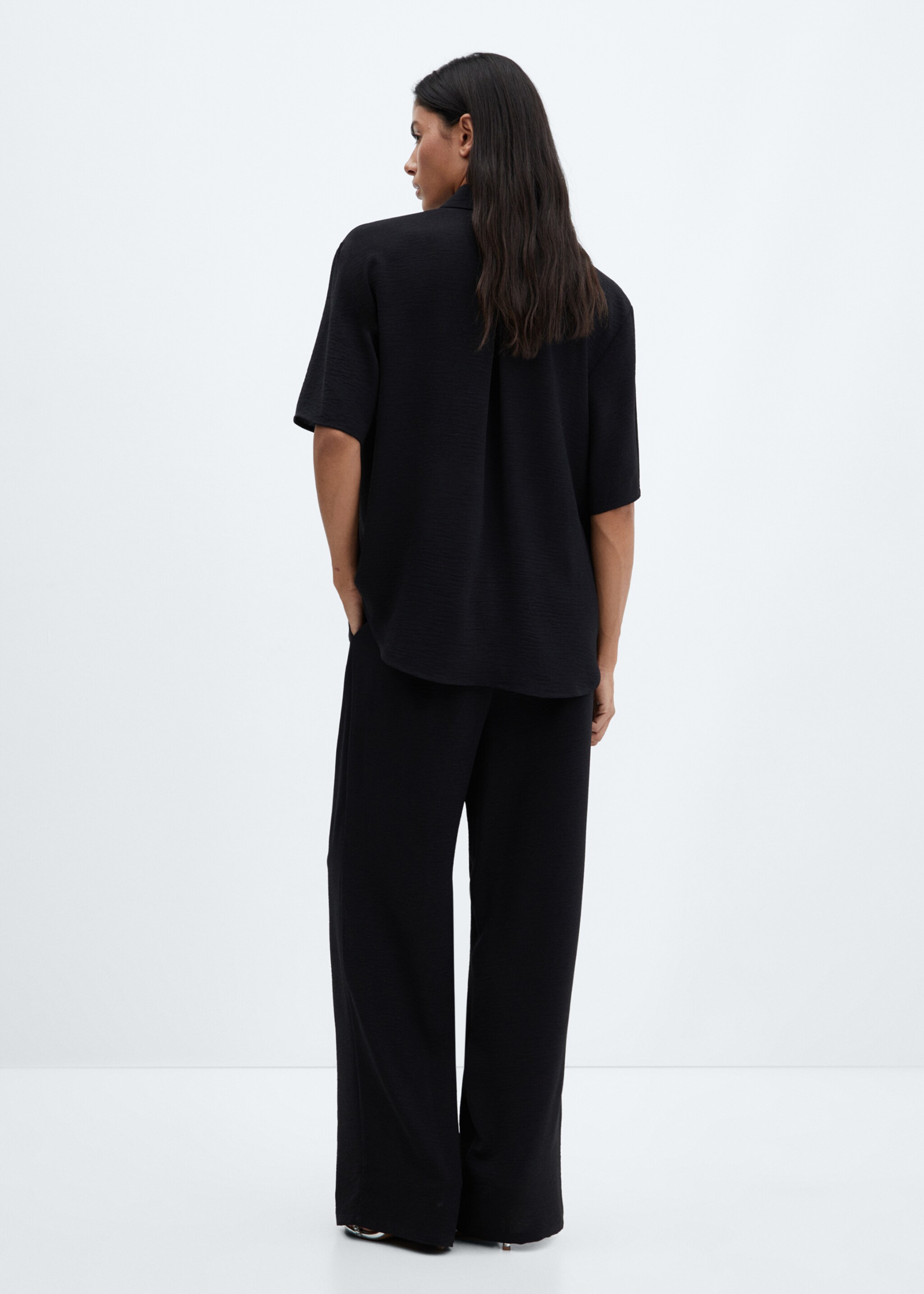 Wideleg trousers with elastic waist - Reverse of the article