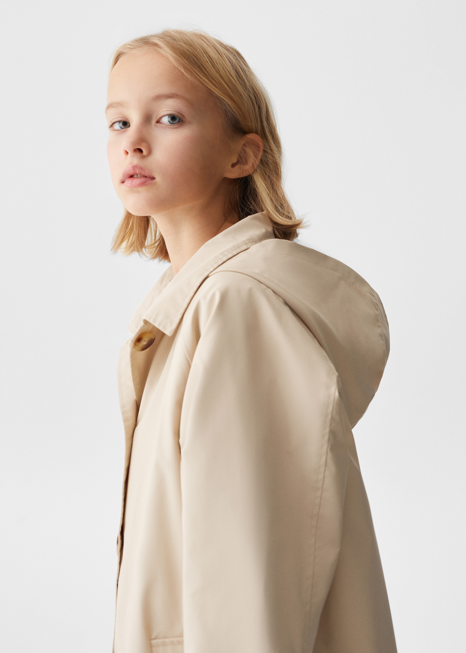 Vattenavvisande trenchcoat med huva - Detaljer om artikeln 1