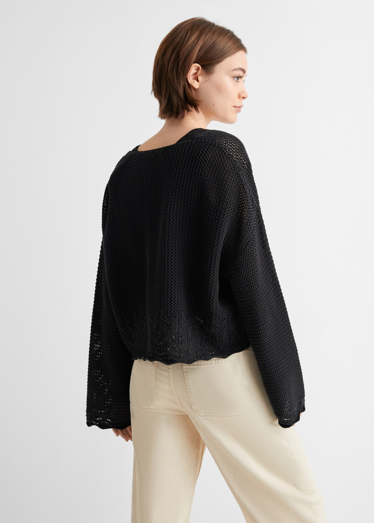 V-neck openwork knitted sweater - Reverse of the article