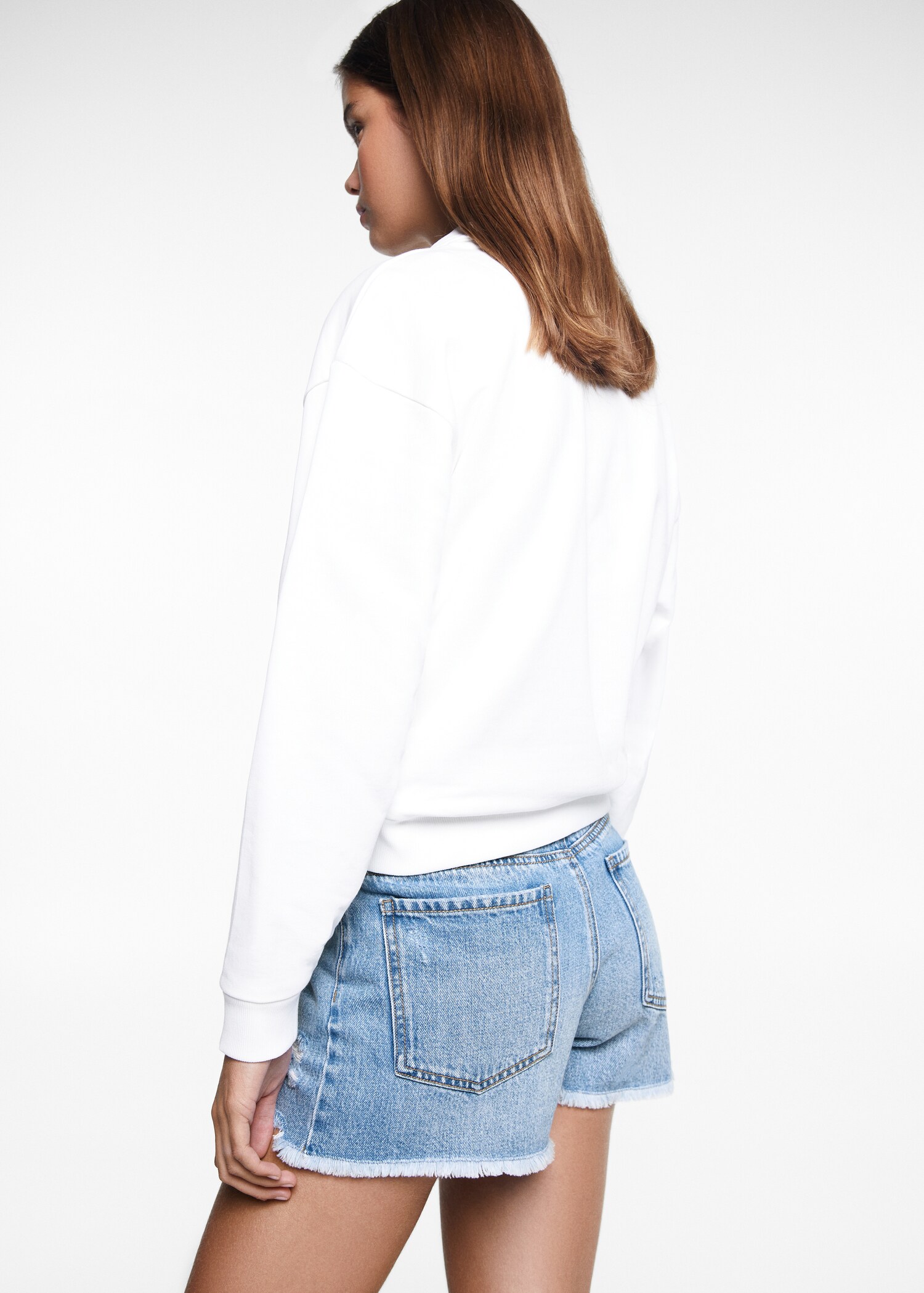Broken denim shorts - Reverse of the article