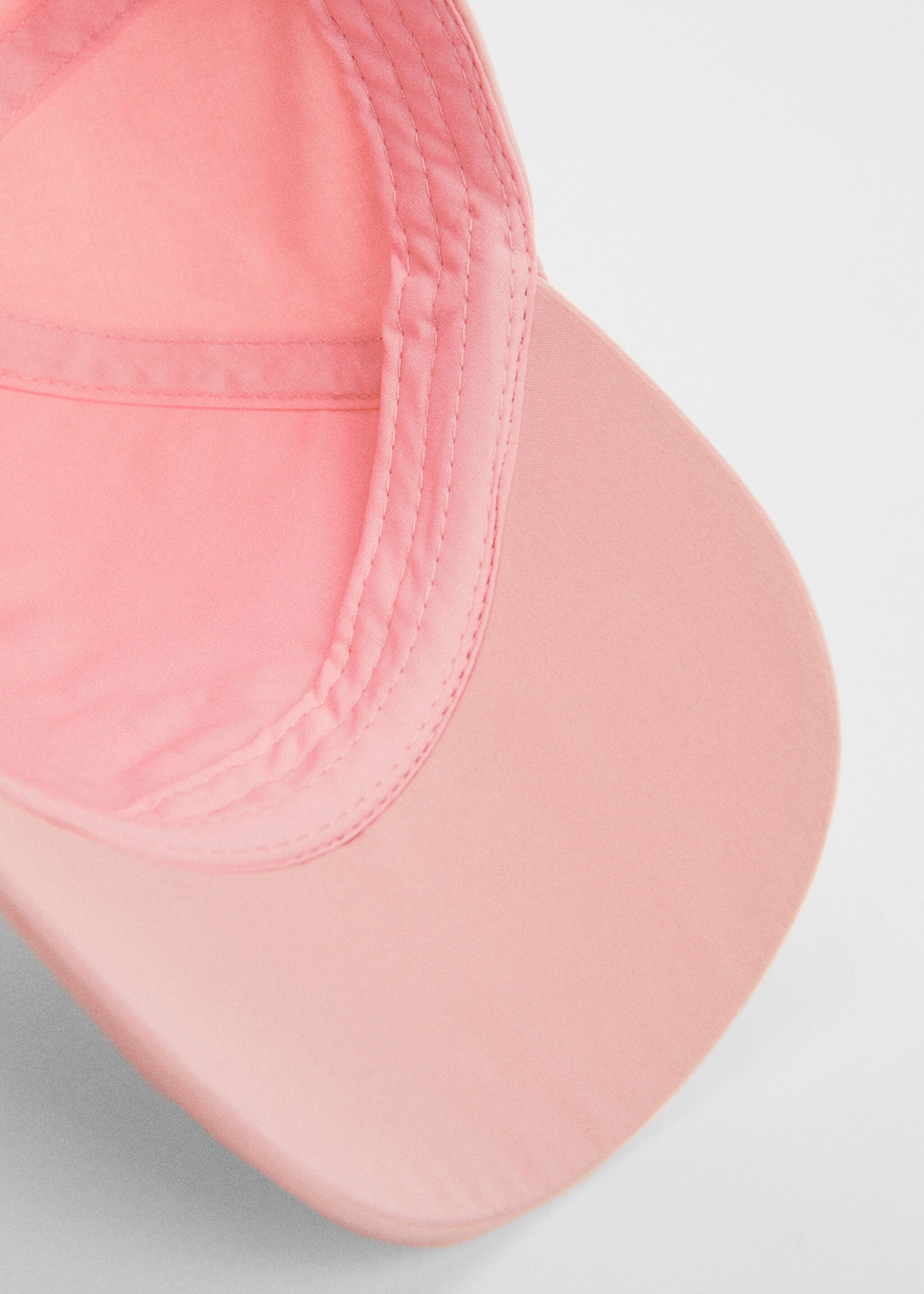 Cap with embroidered letter - Details of the article 2, Pale Pink. Ref: 67076747-00.