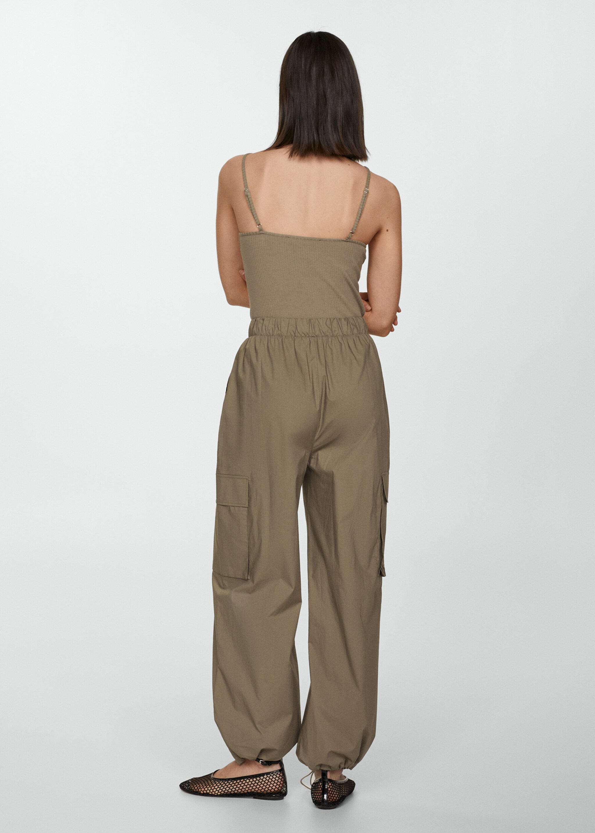 Fallschirm-Jumpsuit mit Trägern - Rückseite des Artikels