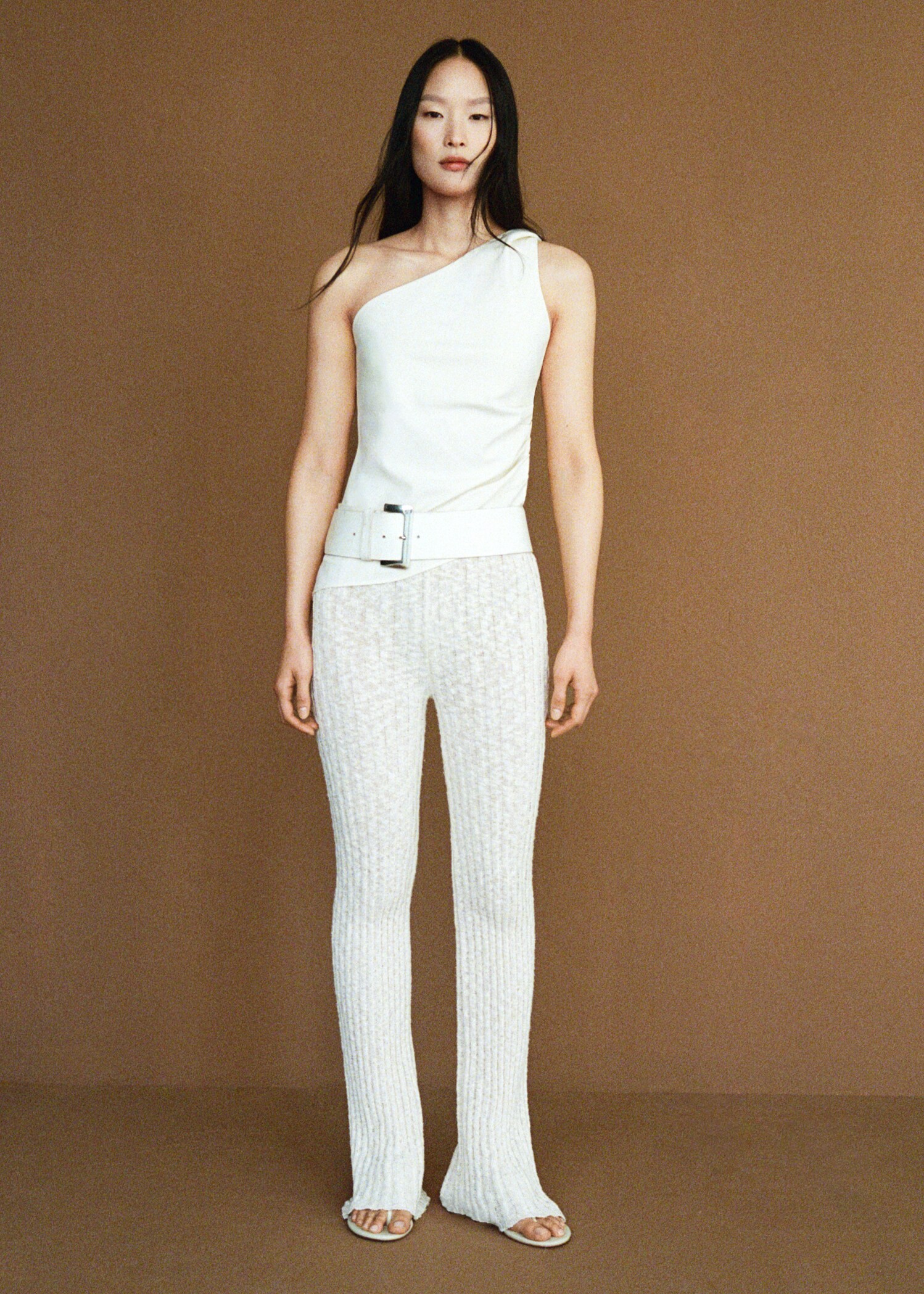 Flared ribbed knitted trousers - Details of the article 7