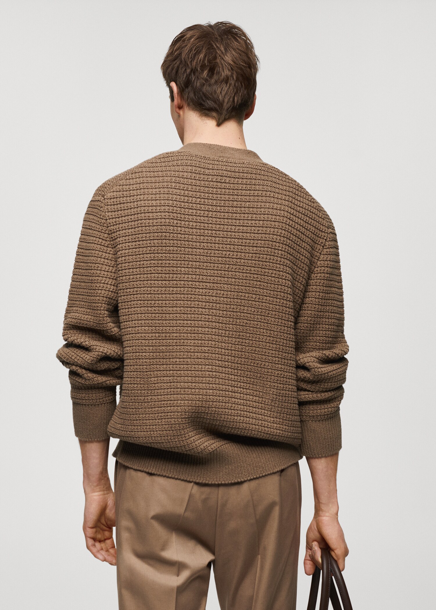 Buttoned knit braided cardigan - Reverse of the article