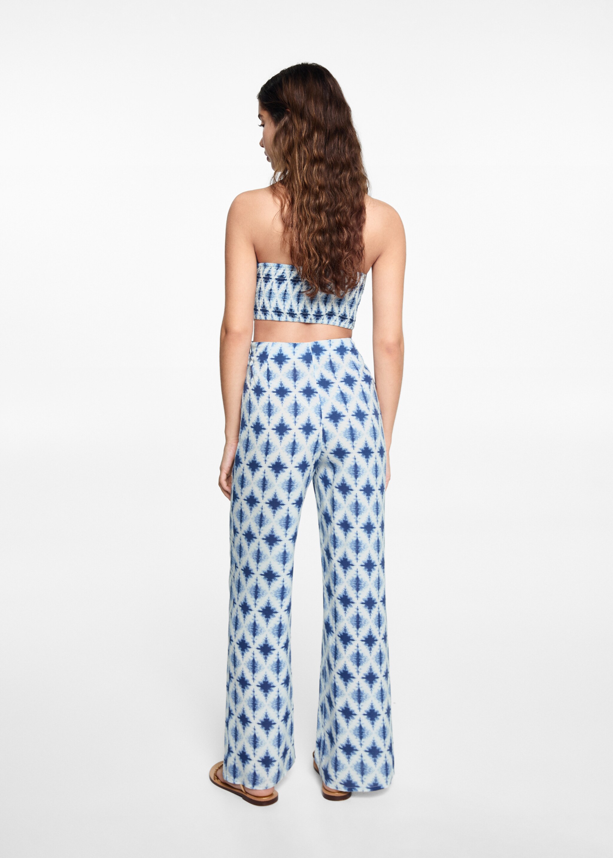Printed jumpsuit with openings - Reverse of the article