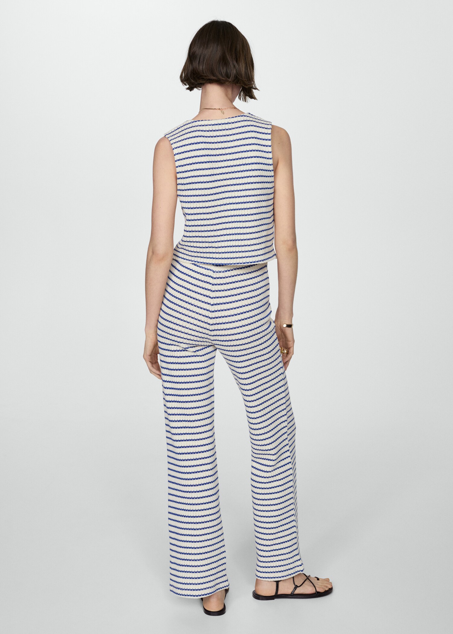 Crochet striped trousers - Reverse of the article