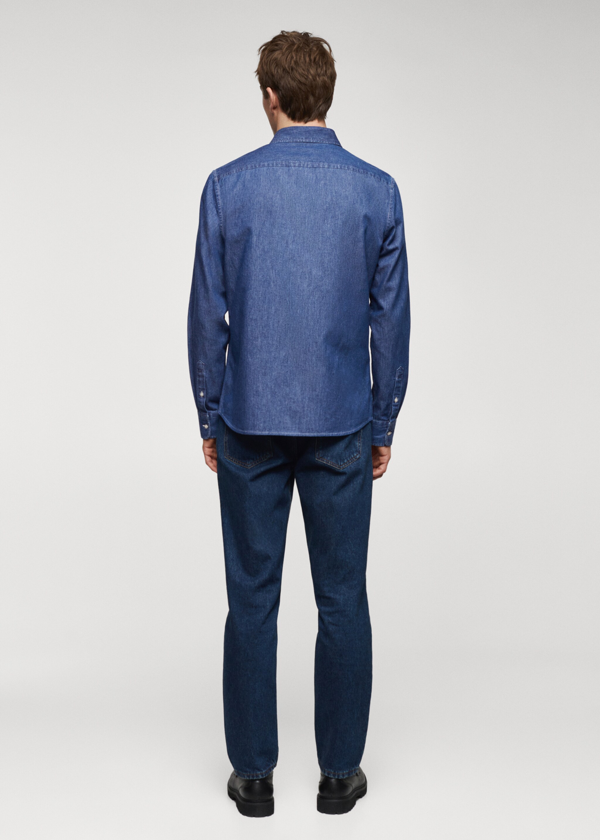 Denim overshirt with pockets - Reverse of the article